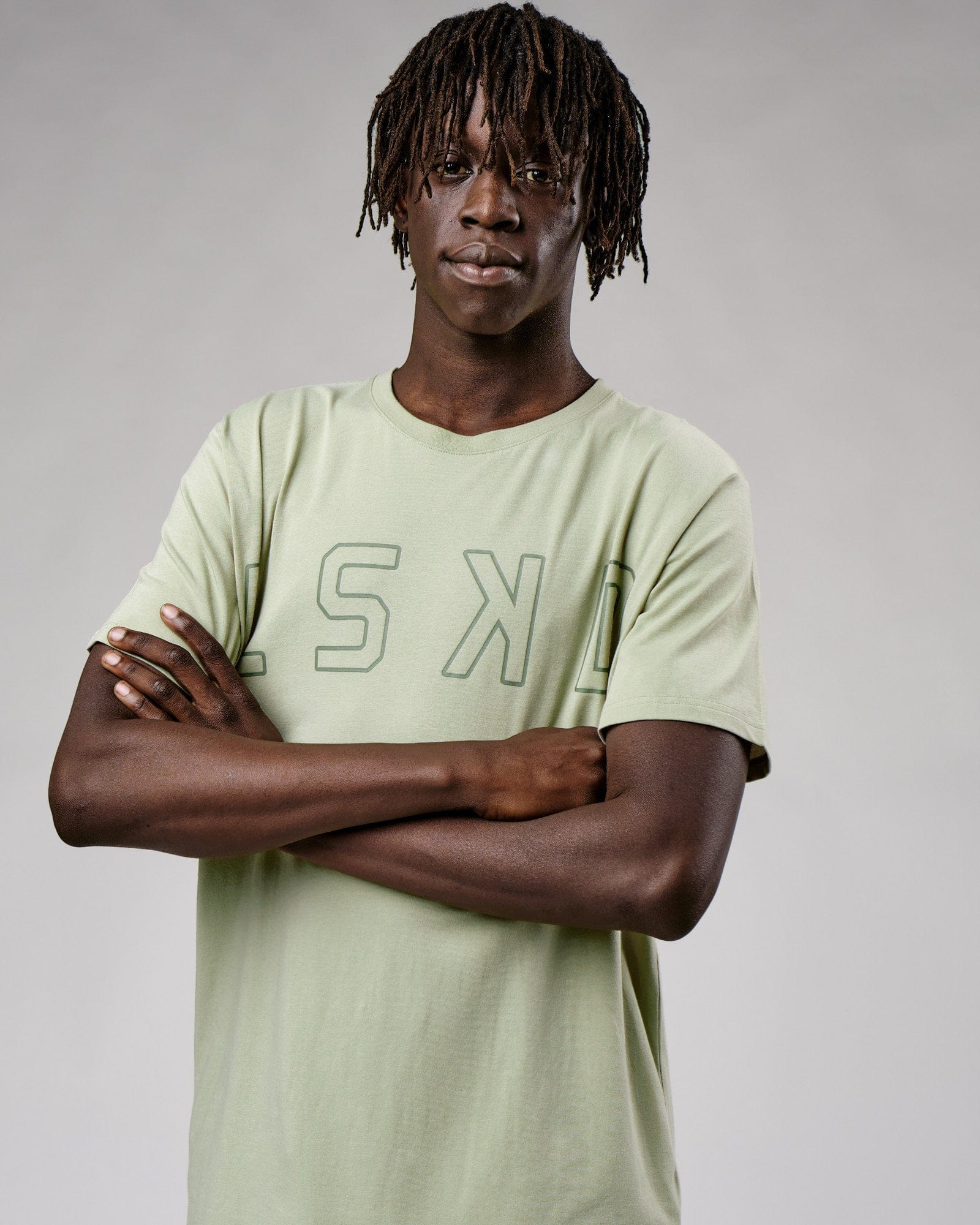 Model wearing Expand FLXCotton Tee - Desert Sage