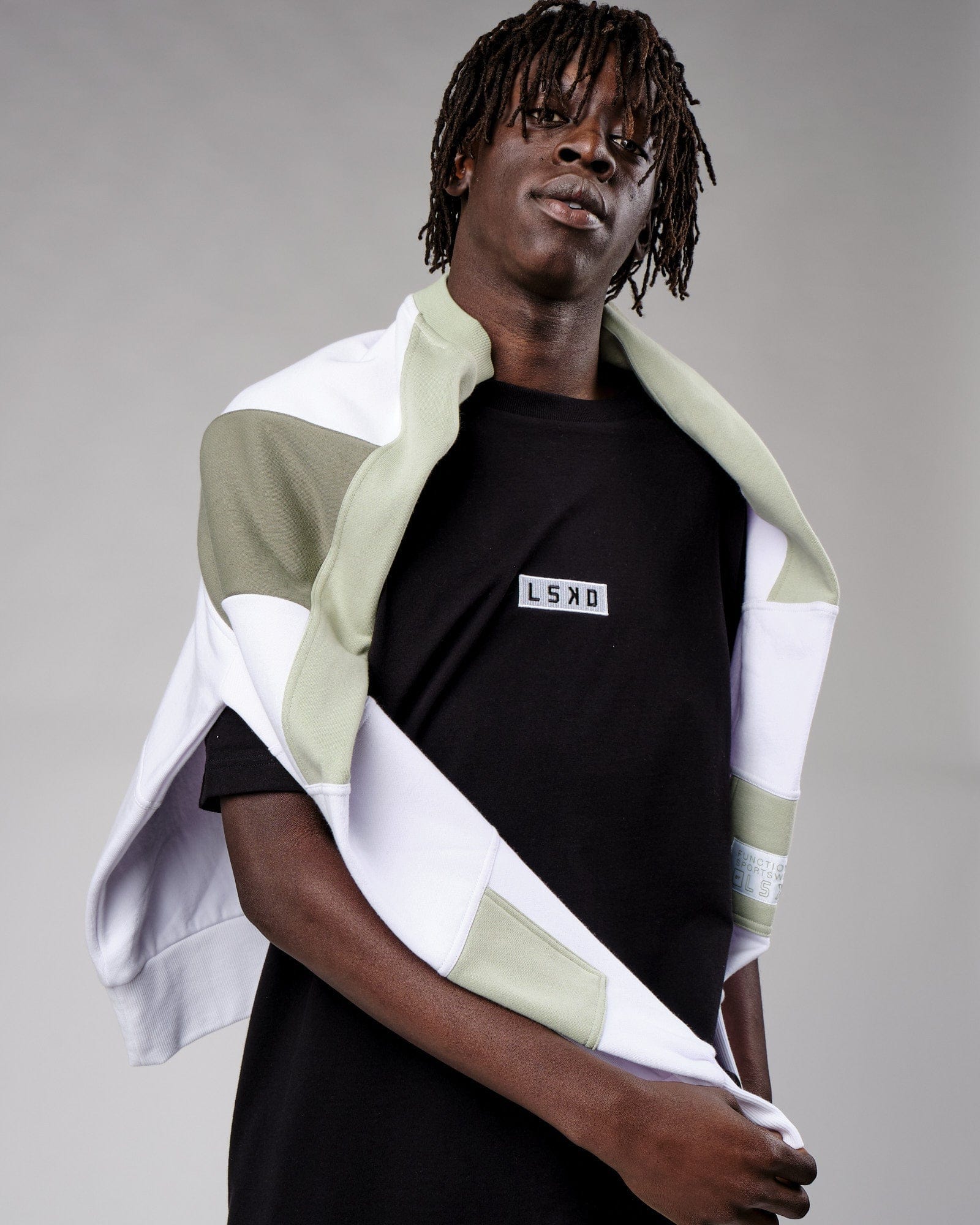 Model wearing Cornerstone Tee Oversize - Black