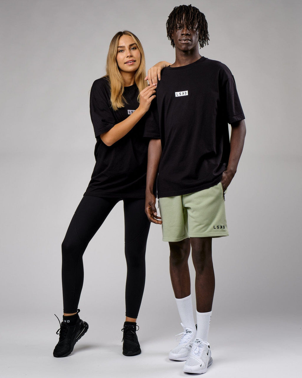 Model wearing Unisex Cornerstone Tee Oversize - Black