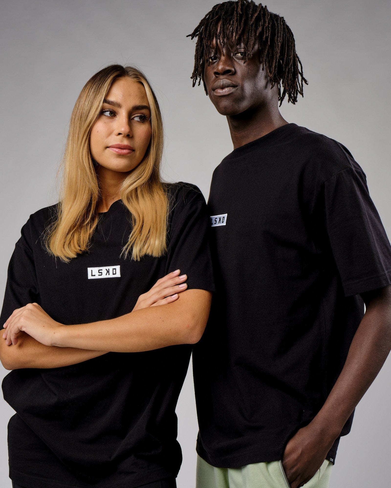 Model wearing Unisex Cornerstone Tee Oversize - Black