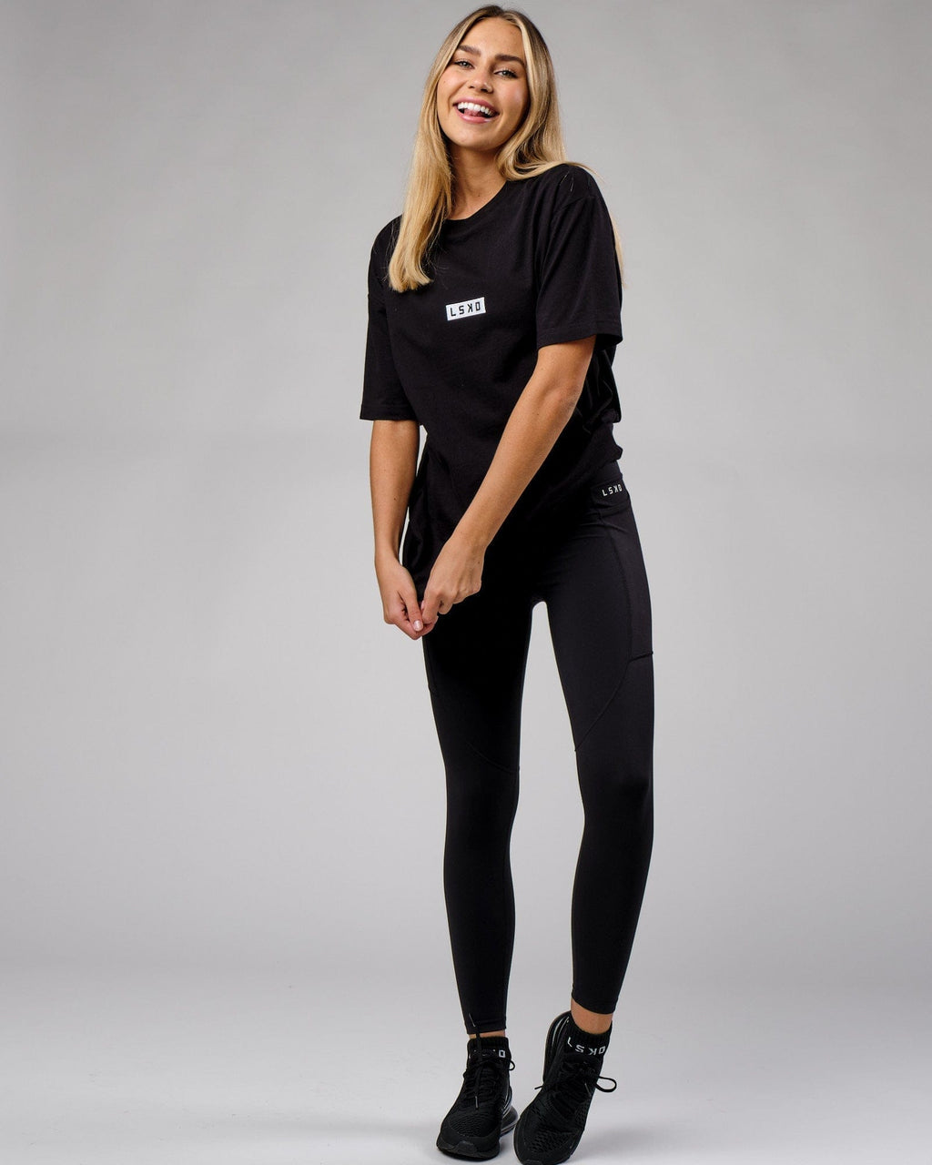 Model wearing Unisex Cornerstone Tee Oversize - Black