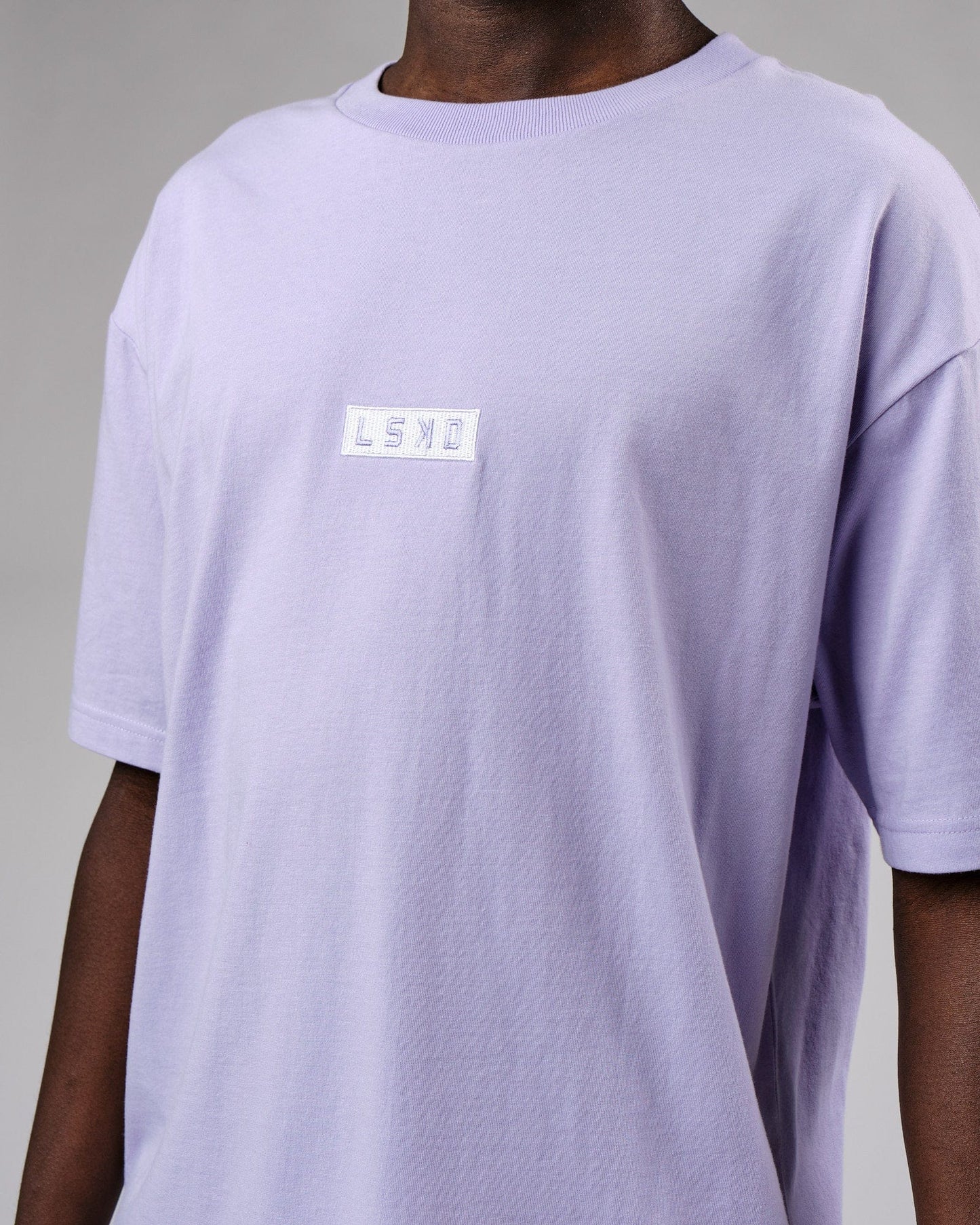 Model wearing Cornerstone Tee Oversize - Cosmic Sky