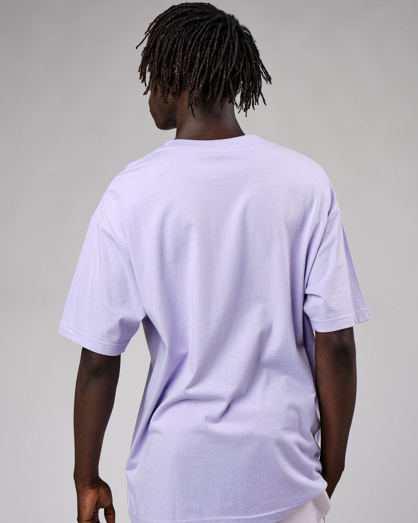 Model wearing Cornerstone Tee Oversize - Cosmic Sky