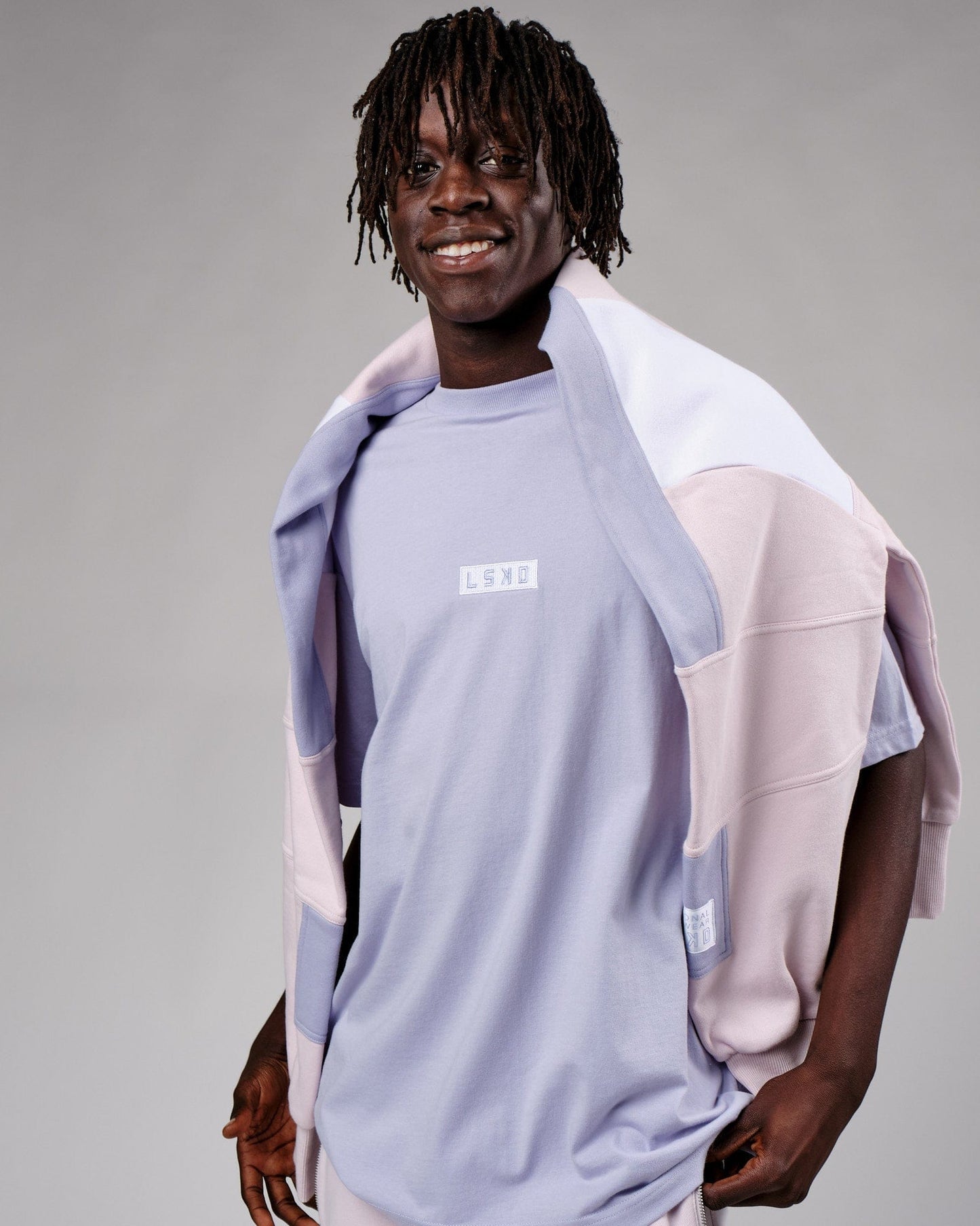 Model wearing Cornerstone Tee Oversize - Cosmic Sky