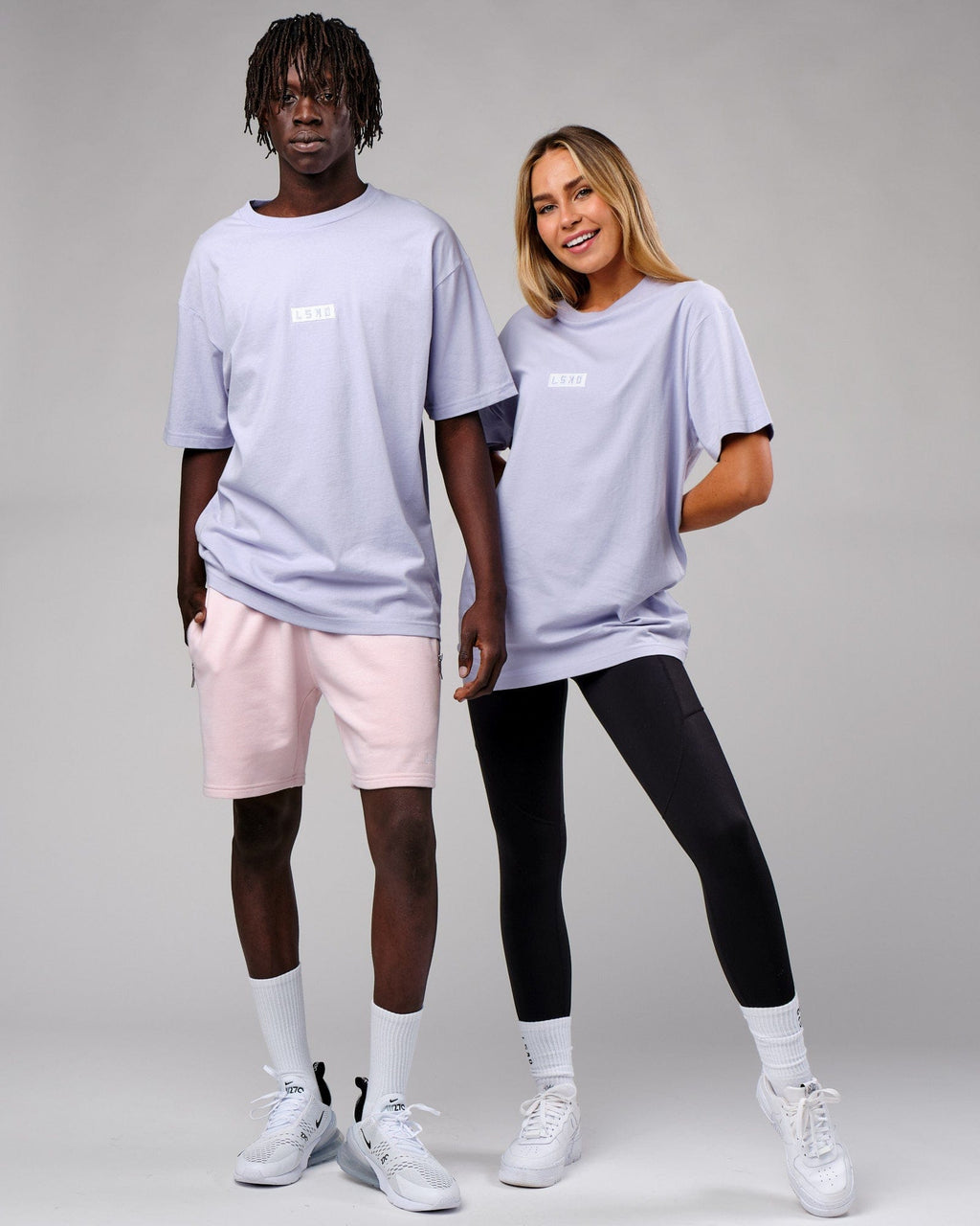 Model wearing Unisex Cornerstone Tee Oversize - Cosmic Sky