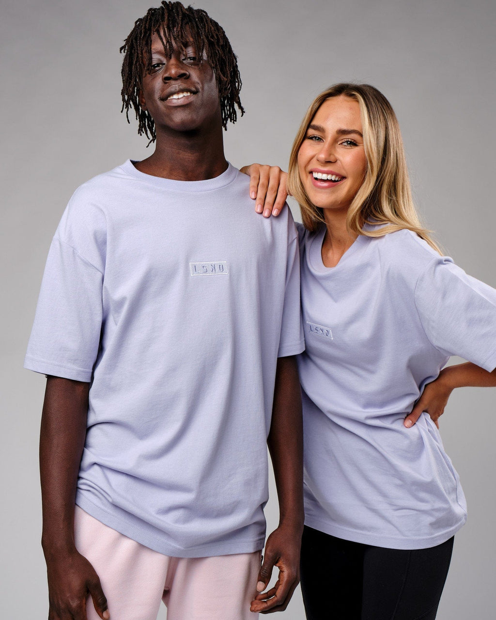 Model wearing Unisex Cornerstone Tee Oversize - Cosmic Sky