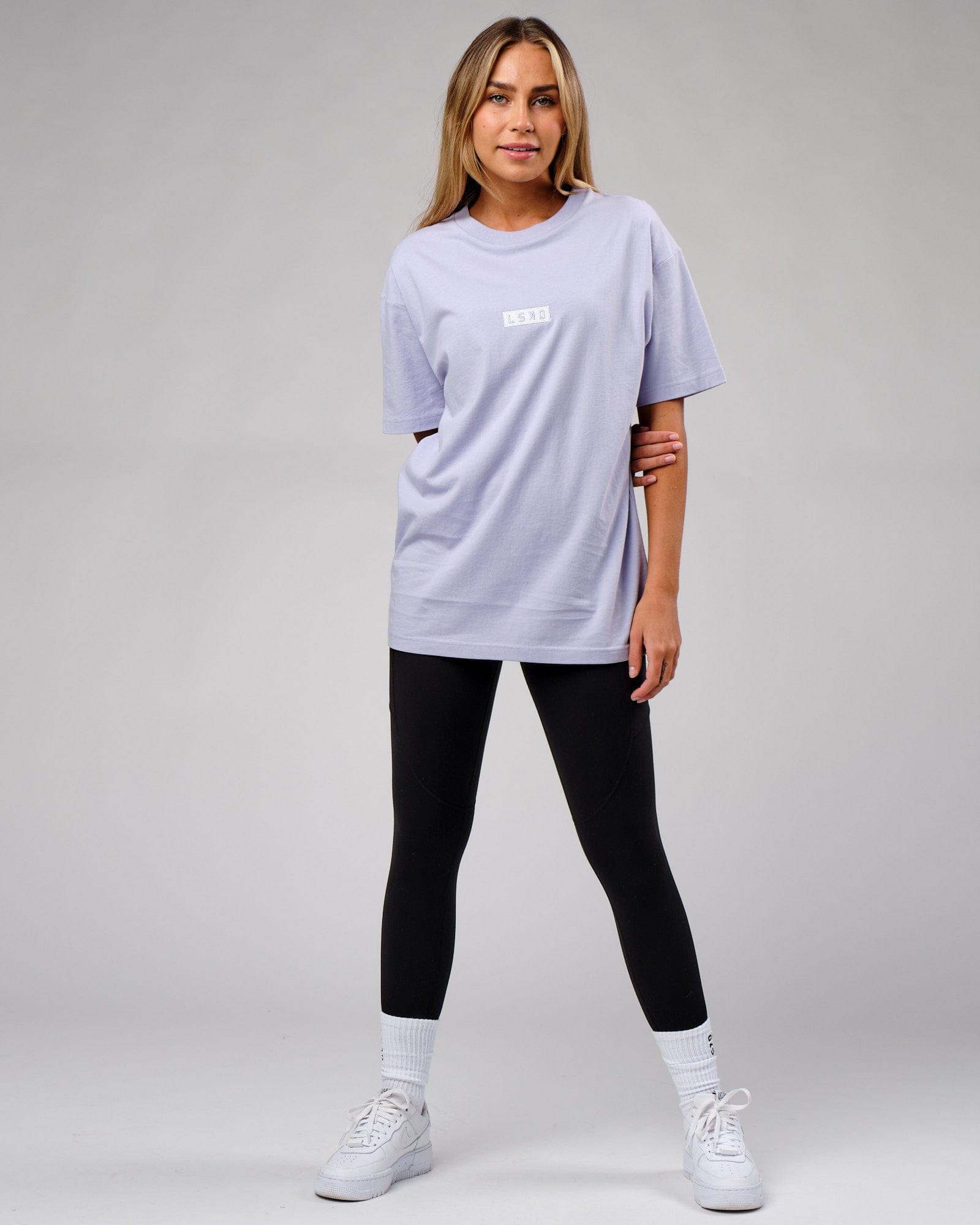 Model wearing Unisex Cornerstone Tee Oversize - Cosmic Sky