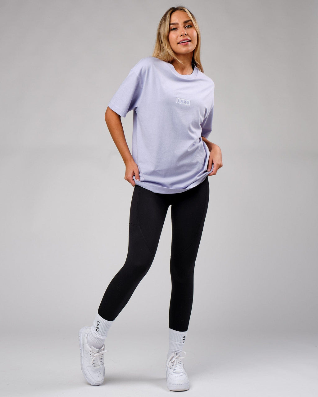 Model wearing Unisex Cornerstone Tee Oversize - Cosmic Sky