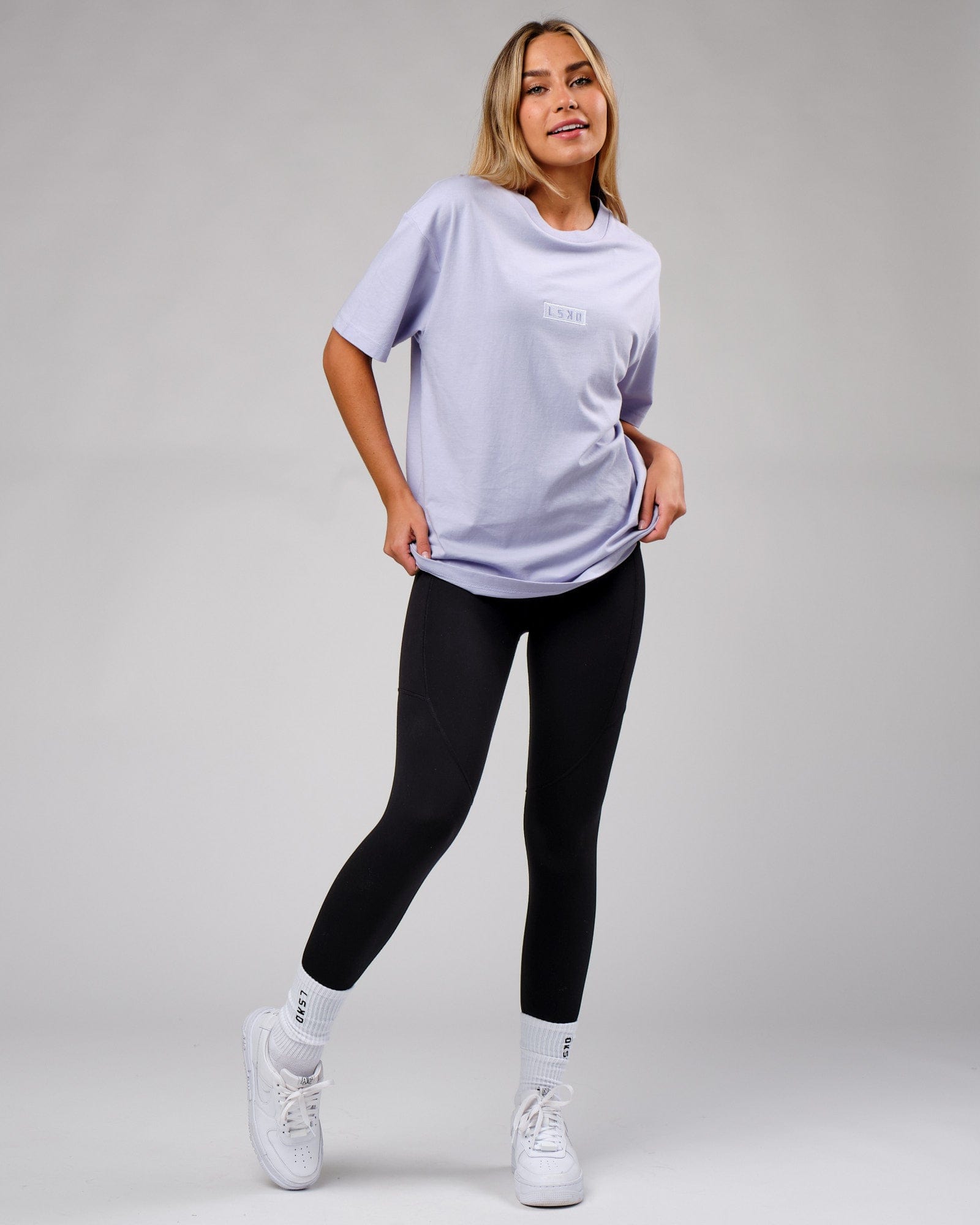 Model wearing Unisex Cornerstone Tee Oversize - Cosmic Sky