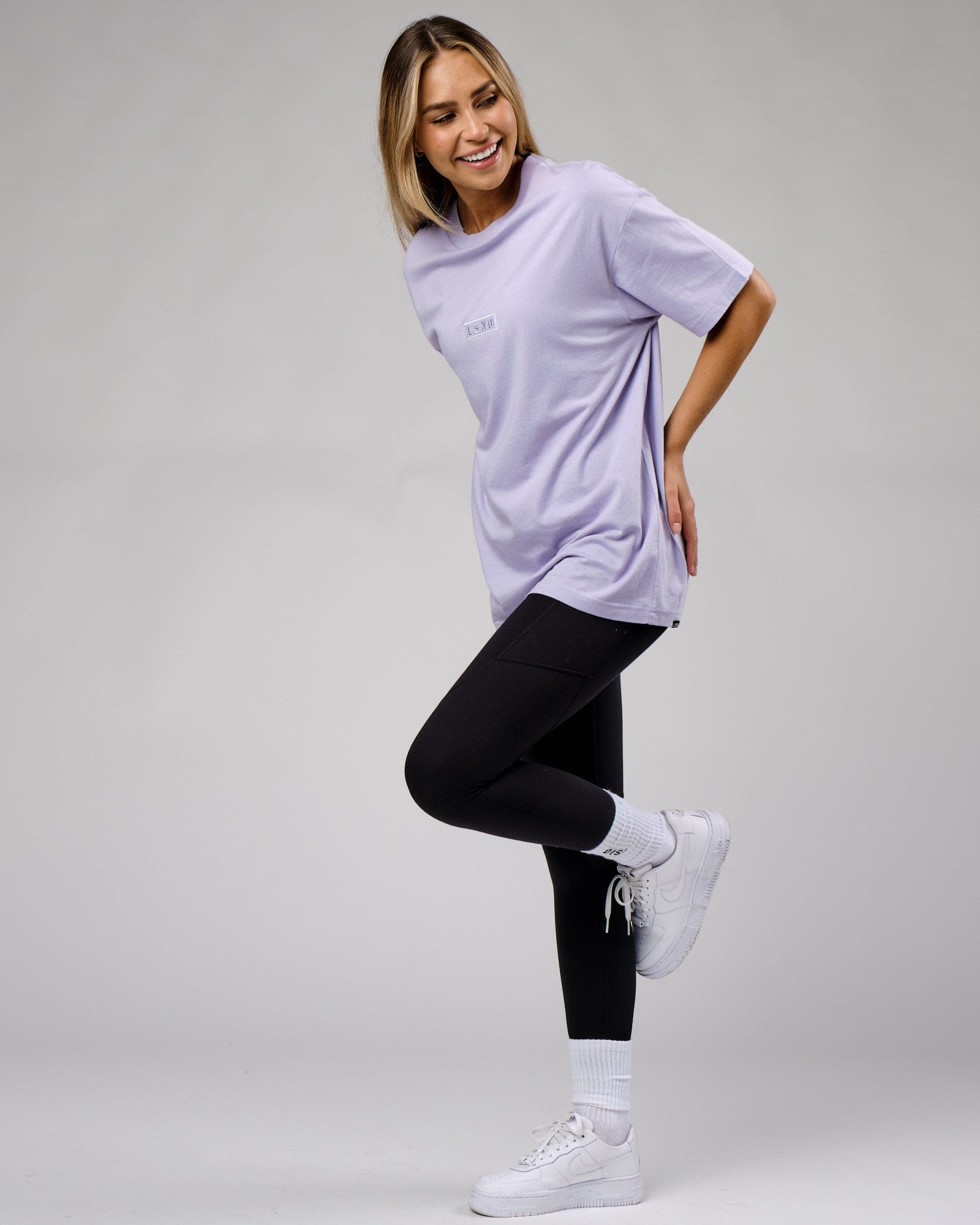 Model wearing Unisex Cornerstone Tee Oversize - Cosmic Sky