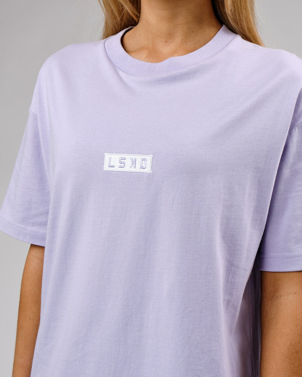 Model wearing Unisex Cornerstone Tee Oversize - Cosmic Sky