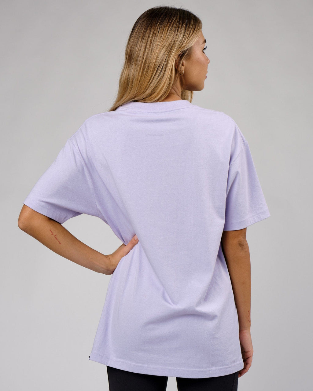 Model wearing Unisex Cornerstone Tee Oversize - Cosmic Sky