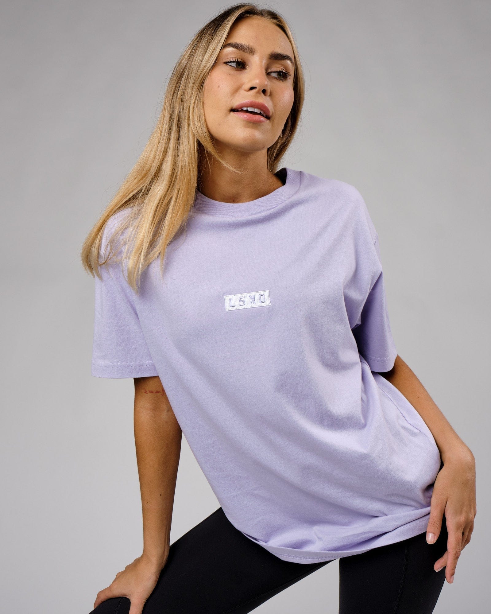 Model wearing Unisex Cornerstone Tee Oversize - Cosmic Sky