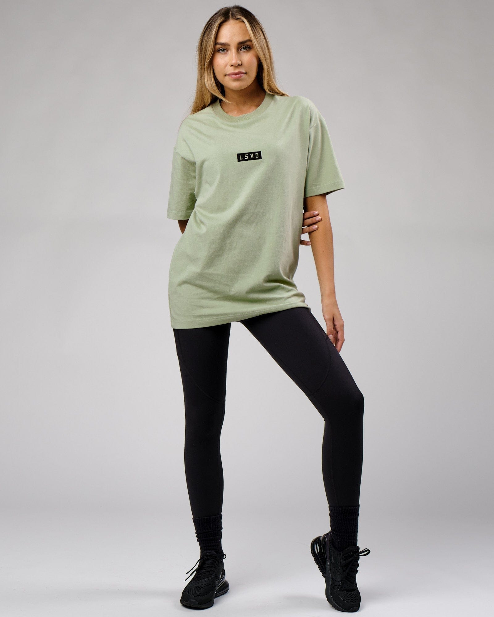 Model wearing Unisex Cornerstone Tee Oversize - Desert Sage