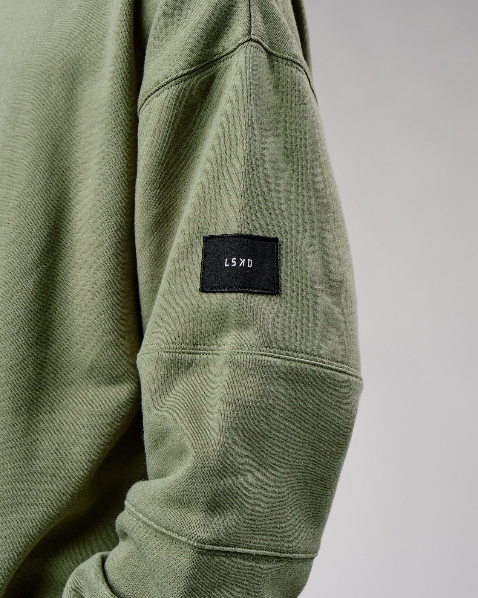 Model wearing Upfield Hoodie Oversize - Sea Spray