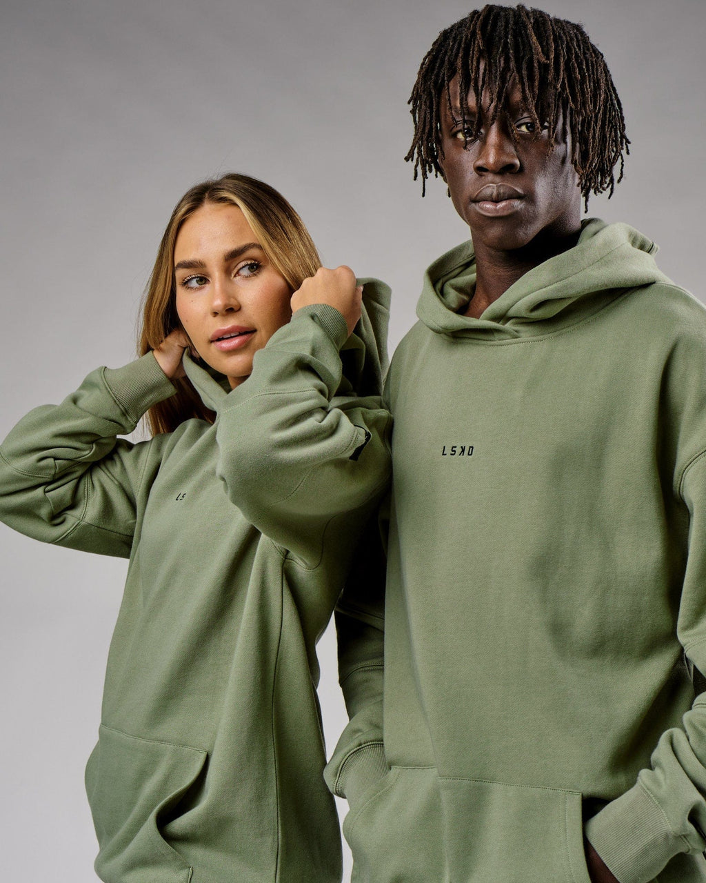 Model wearing Unisex Upfield Hoodie Oversize - Sea Spray