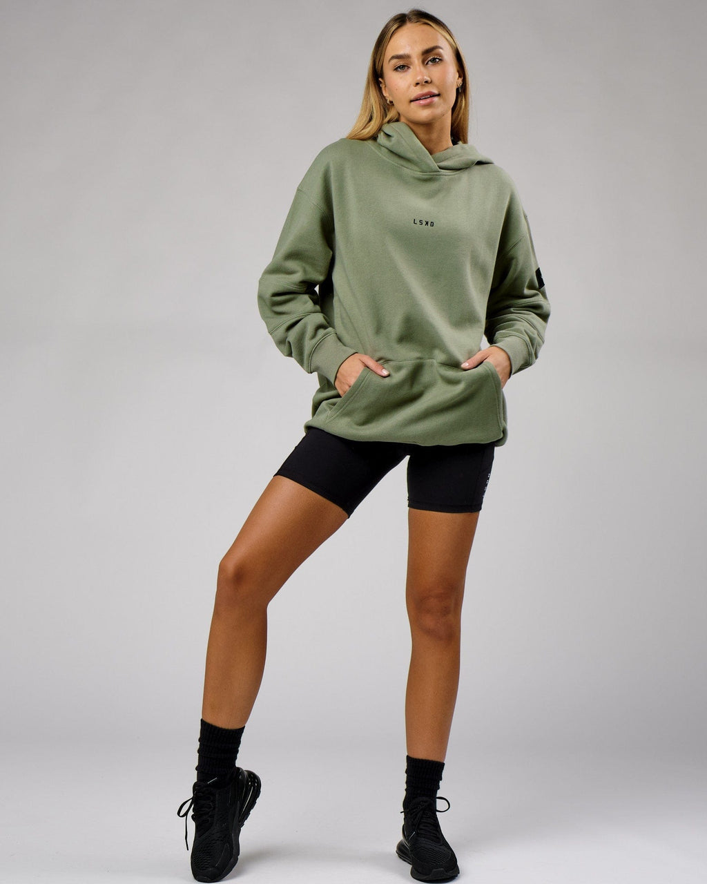 Model wearing Unisex Upfield Hoodie Oversize - Sea Spray