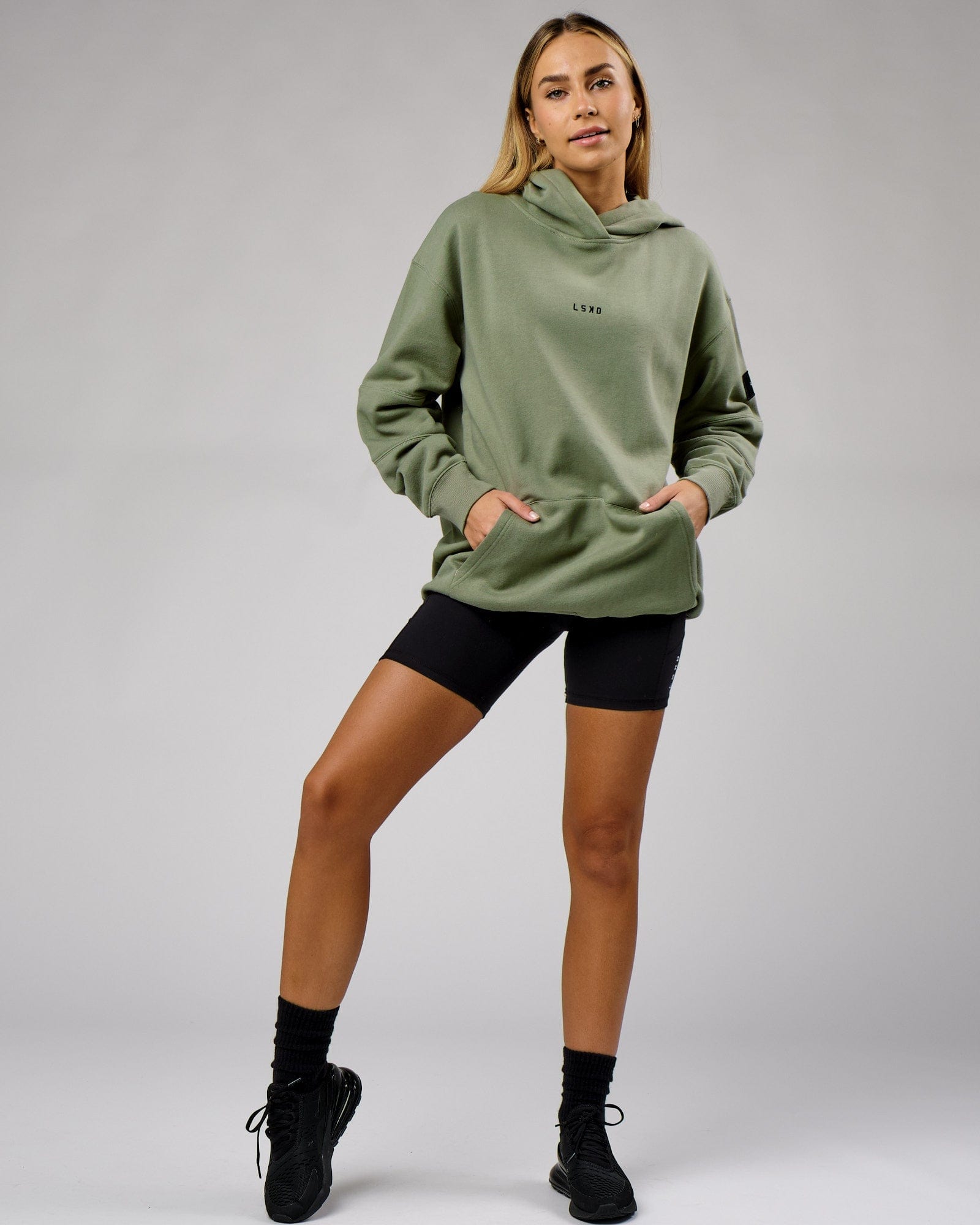Model wearing Unisex Upfield Hoodie Oversize - Sea Spray