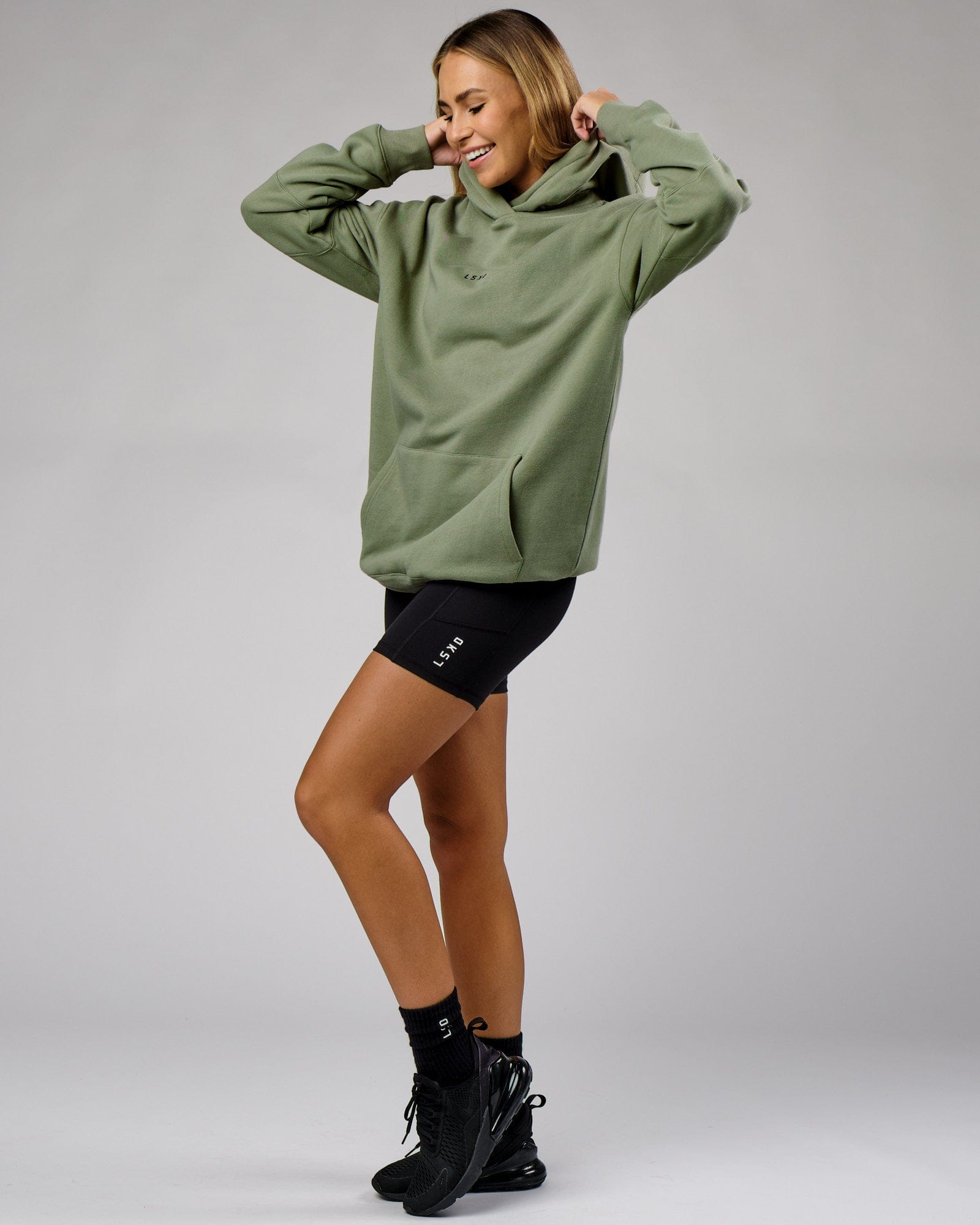 Model wearing Unisex Upfield Hoodie Oversize - Sea Spray