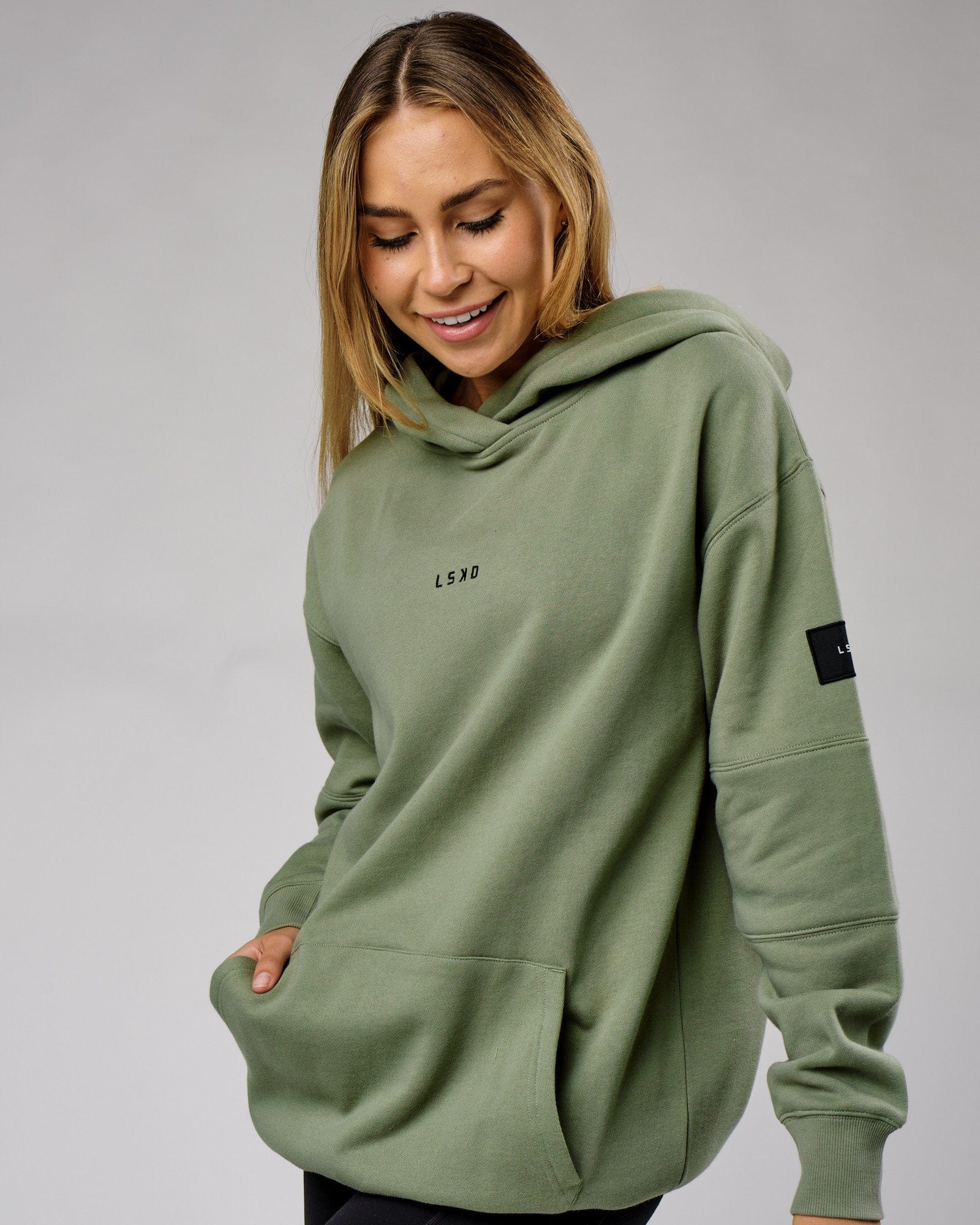 Model wearing Unisex Upfield Hoodie Oversize - Sea Spray