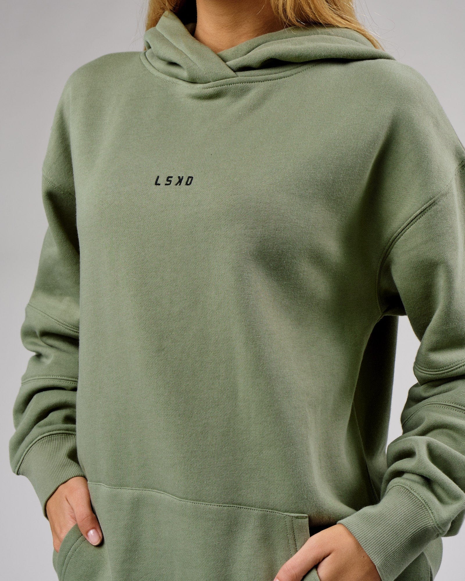 Model wearing Unisex Upfield Hoodie Oversize - Sea Spray