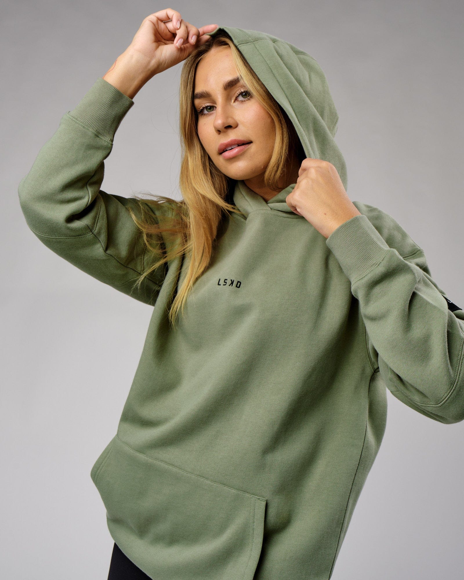 Model wearing Unisex Upfield Hoodie Oversize - Sea Spray