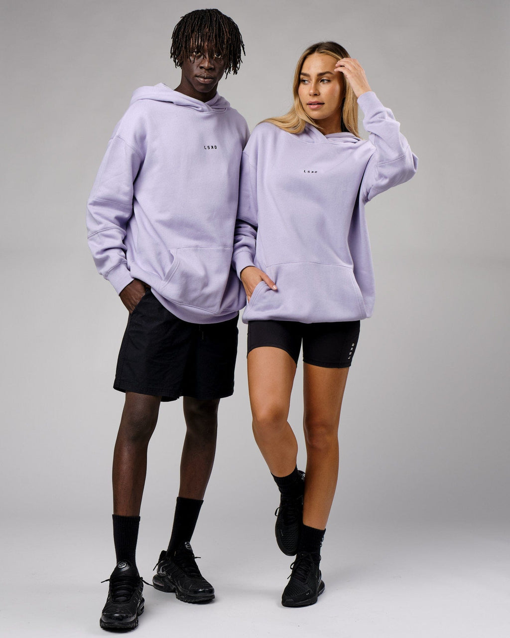 Model wearing Unisex Upfield Hoodie Oversize - Cosmic Sky