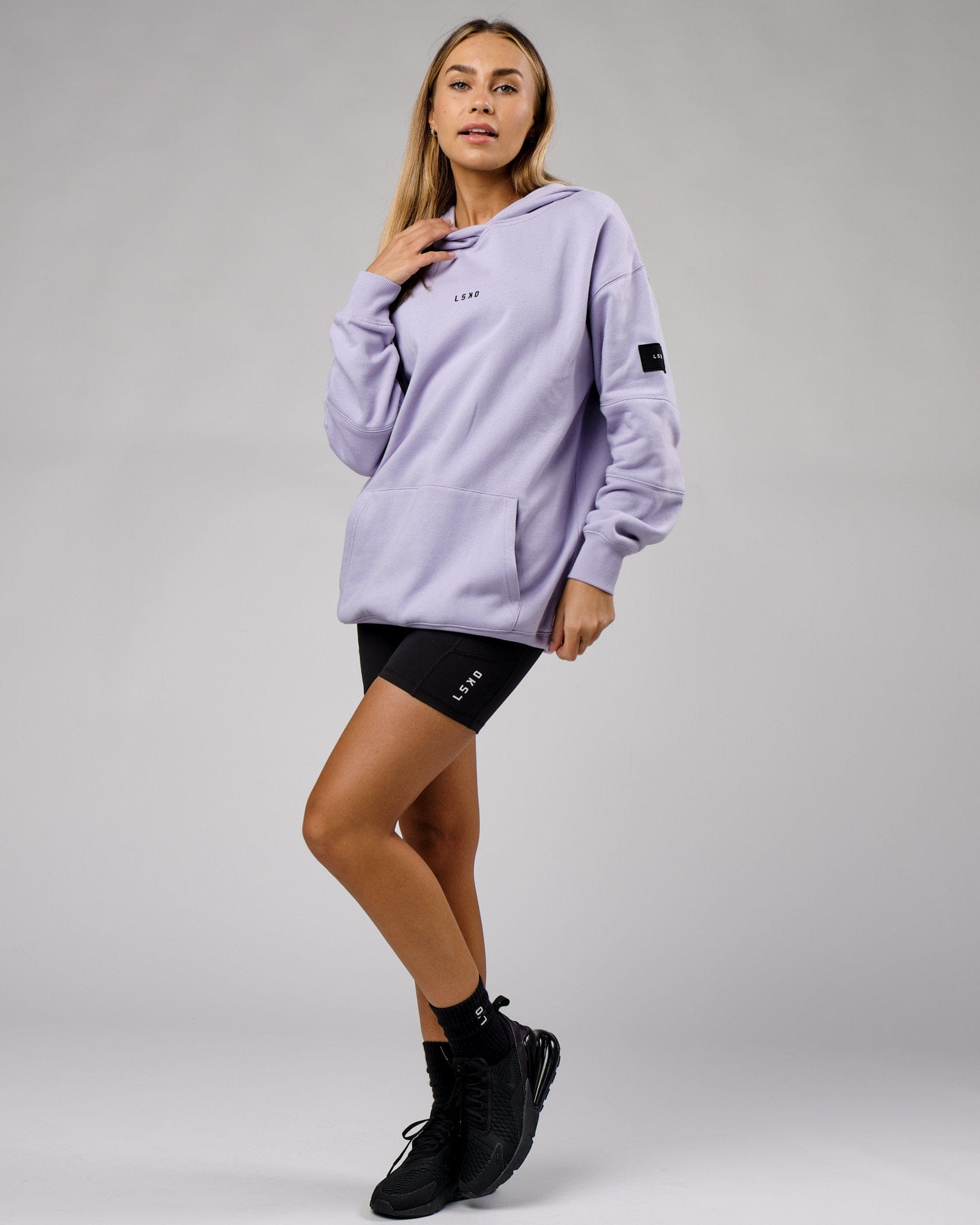 Model wearing Unisex Upfield Hoodie Oversize - Cosmic Sky