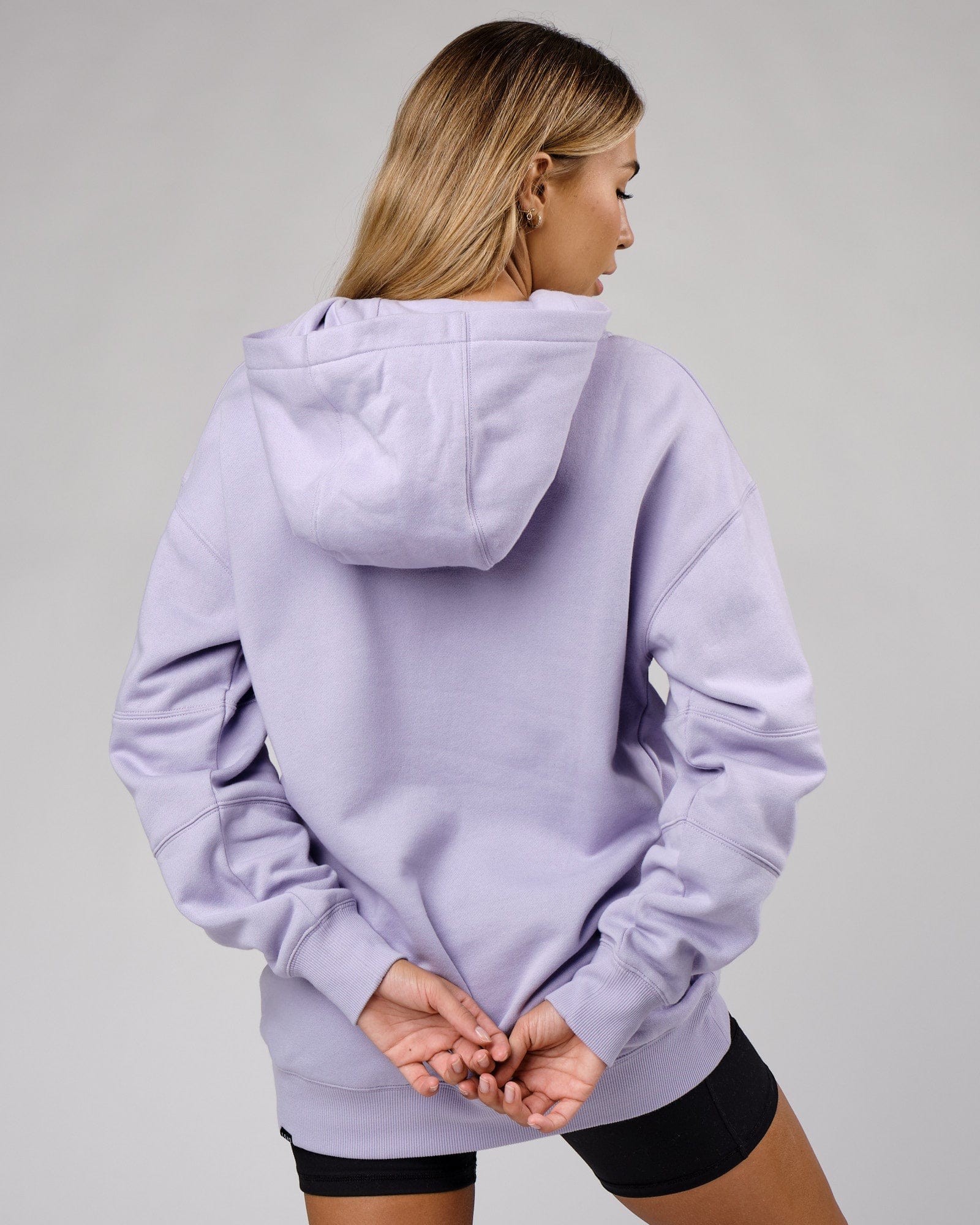 Model wearing Unisex Upfield Hoodie Oversize - Cosmic Sky