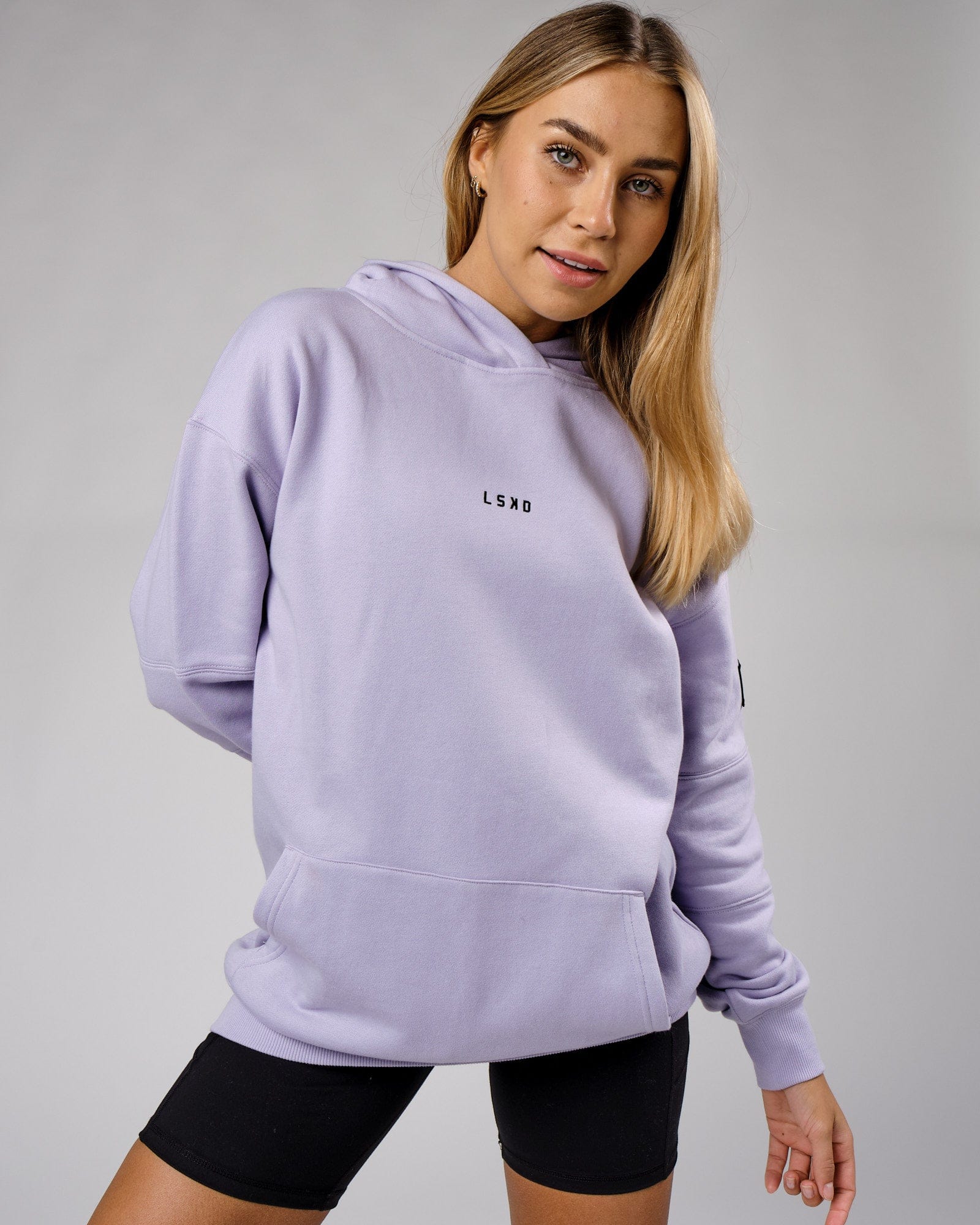 Model wearing Unisex Upfield Hoodie Oversize - Cosmic Sky