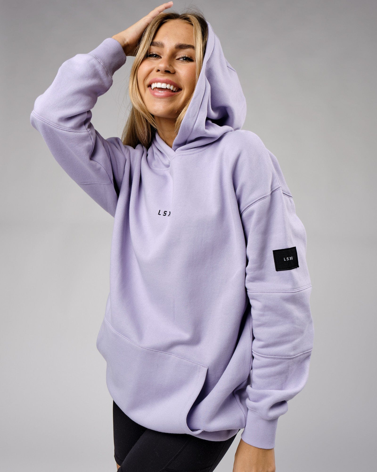 Model wearing Unisex Upfield Hoodie Oversize - Cosmic Sky