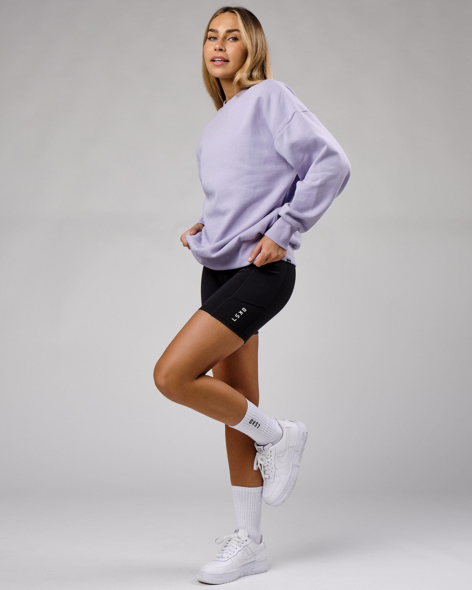 Model wearing Unisex OGTC Sweater Oversize - Cosmic Sky