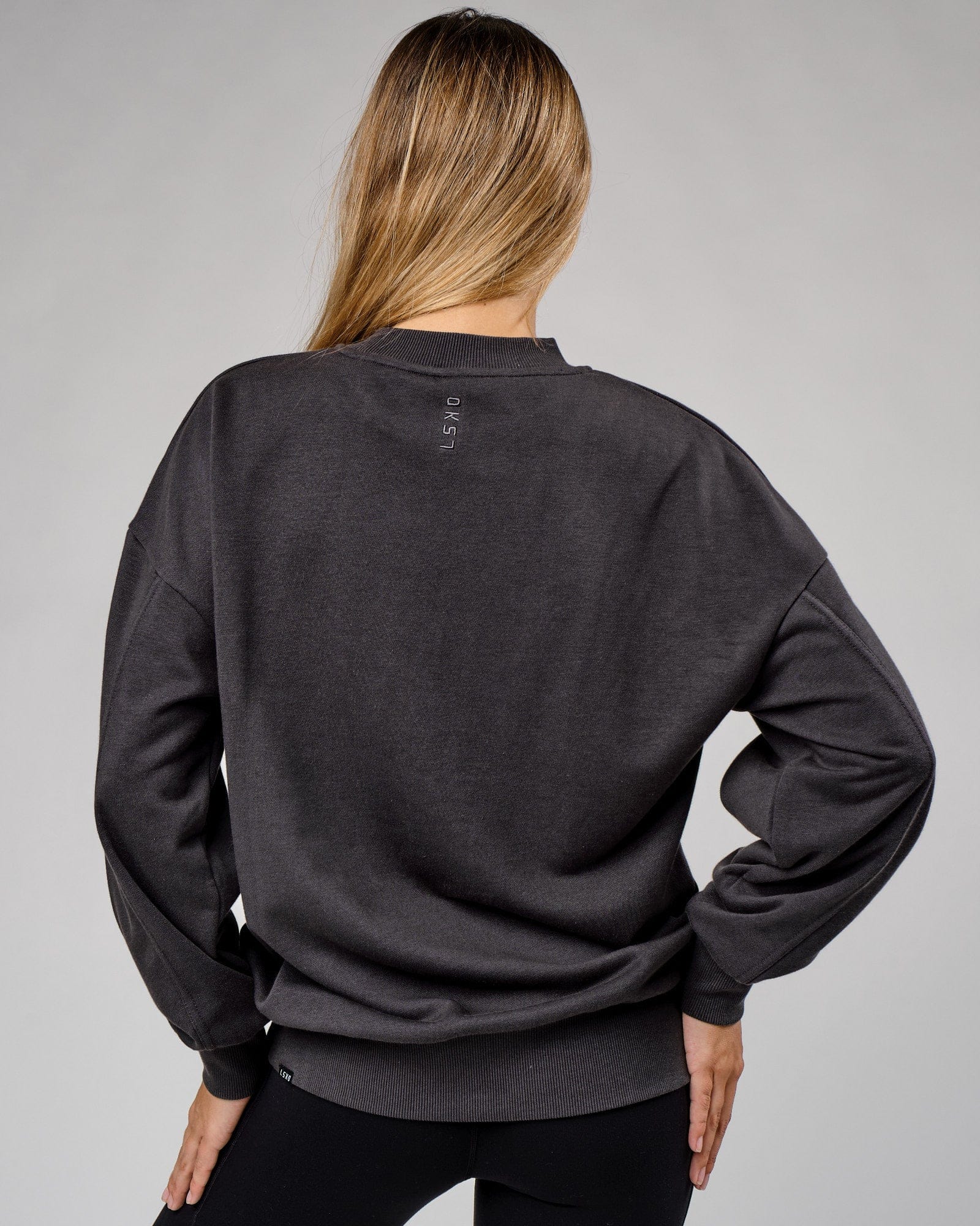 Model wearing Unisex Slice Sweater Oversize - Phantom