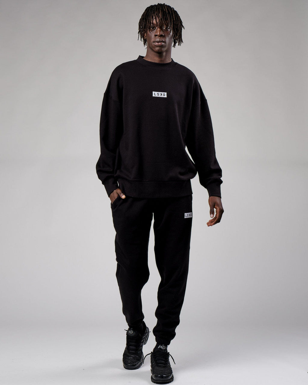 Model wearing Cornerstone Sweater Oversize - Black