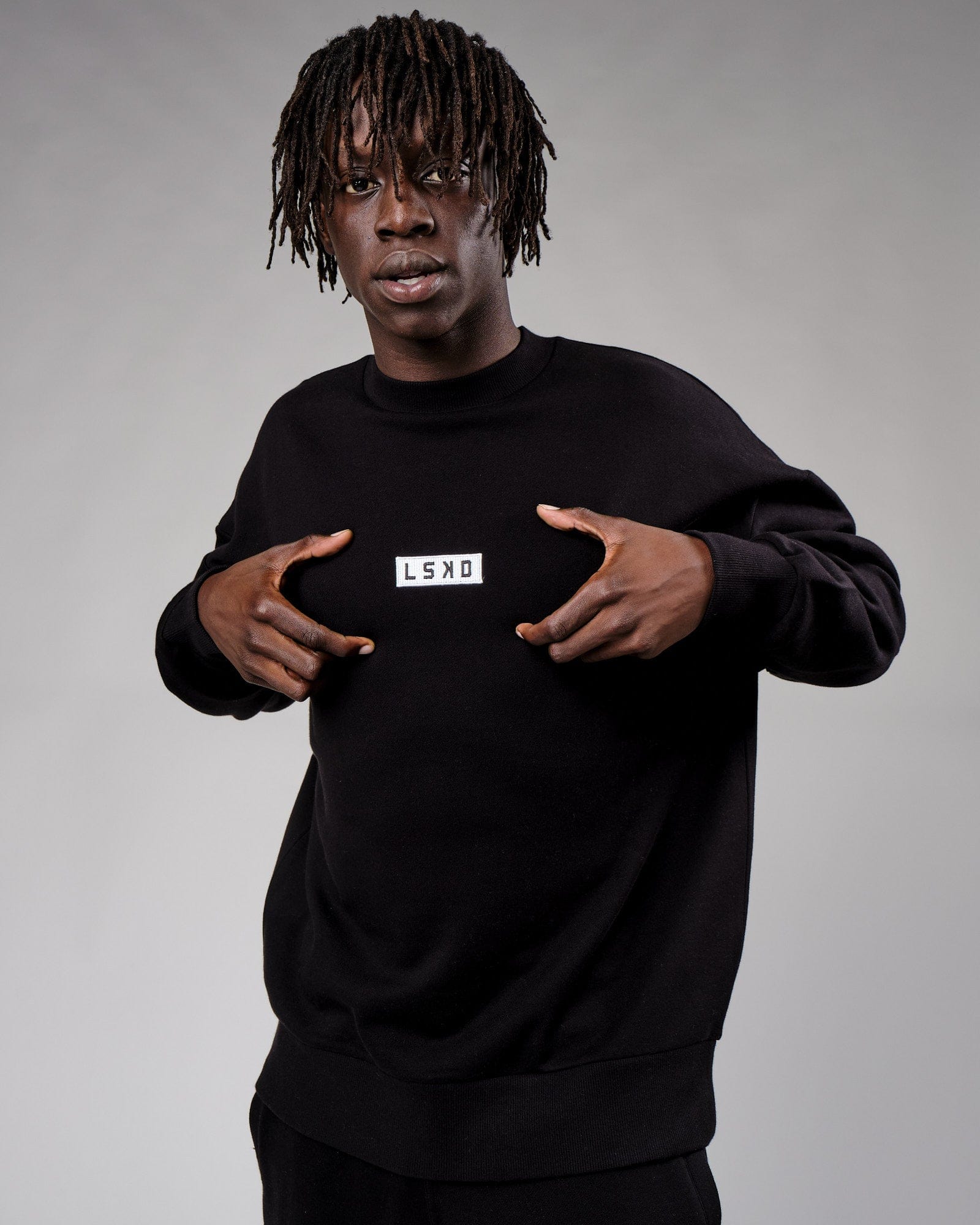 Model wearing Cornerstone Sweater Oversize - Black