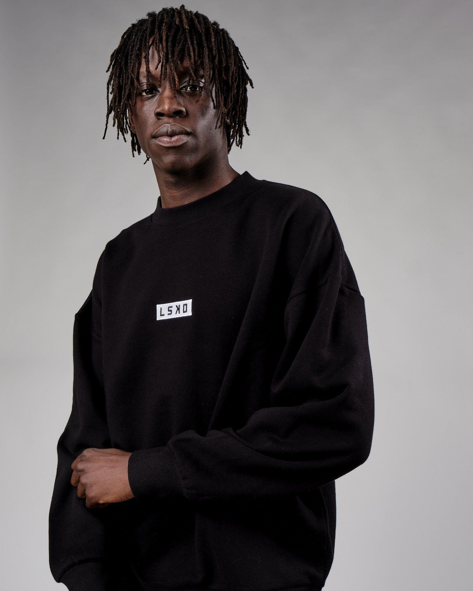 Model wearing Cornerstone Sweater Oversize - Black