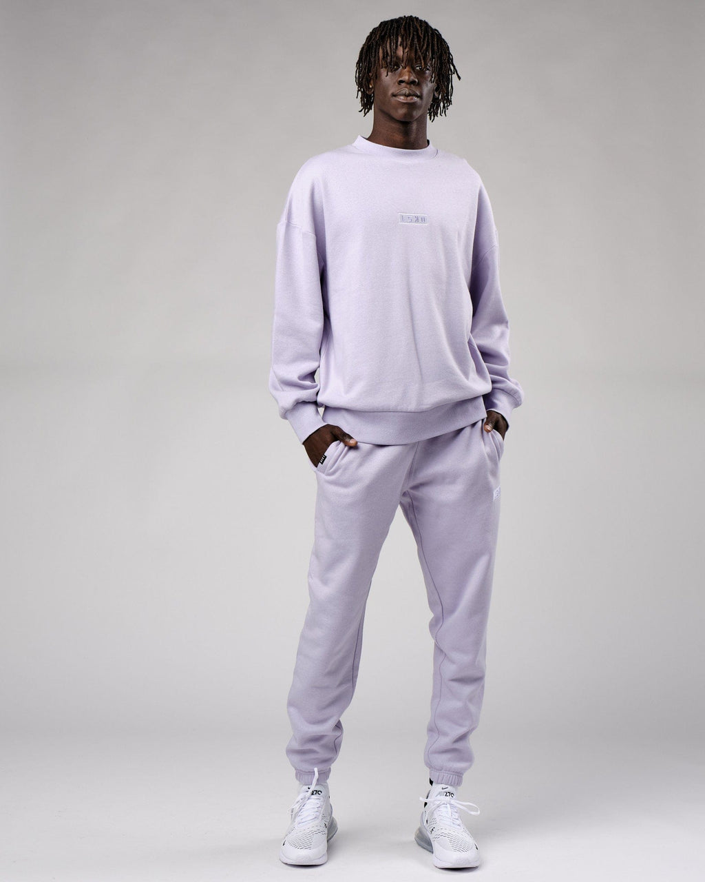 Model wearing Cornerstone Track Pant Oversize - Cosmic Sky