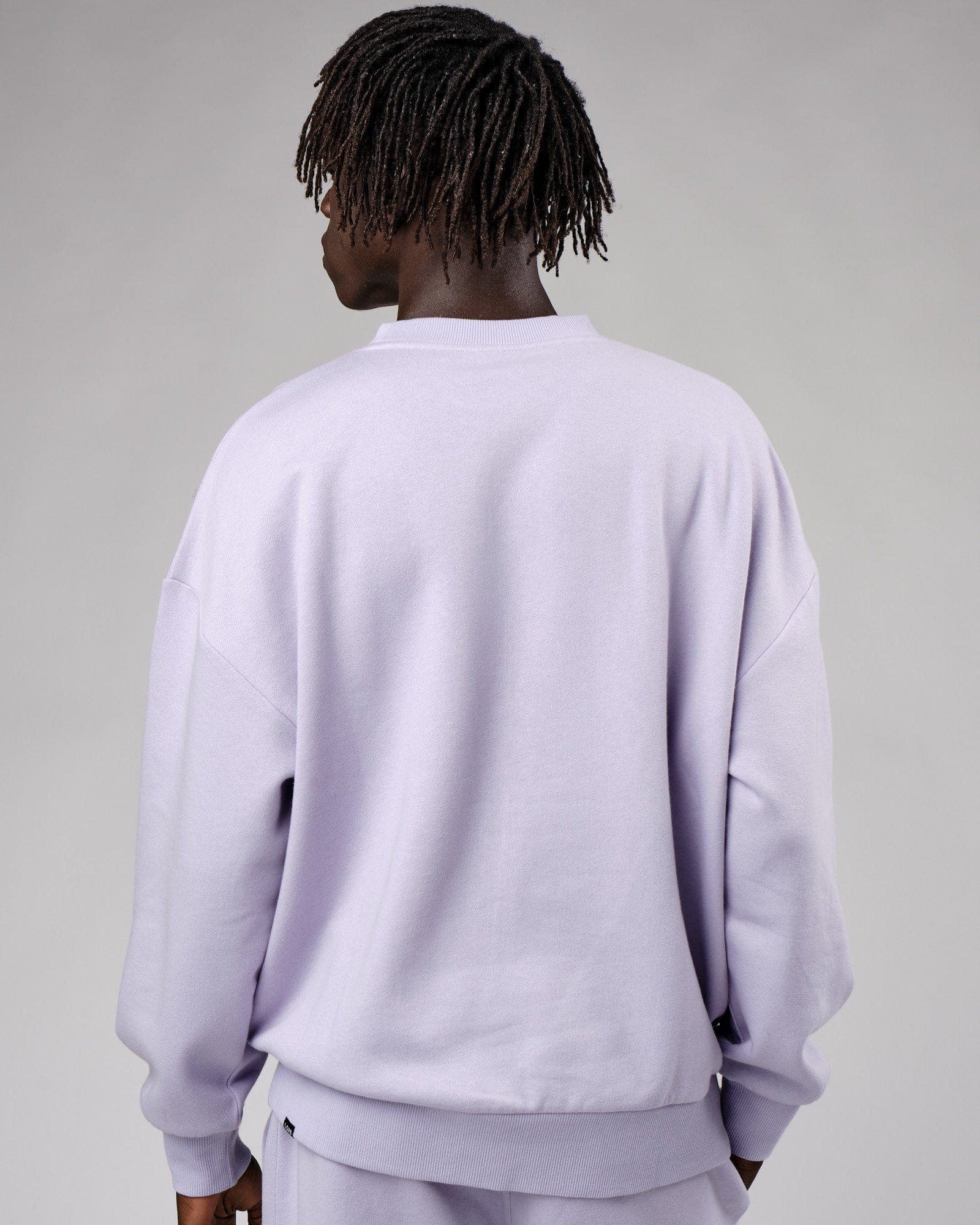 Model wearing Cornerstone Sweater Oversize - Cosmic Sky