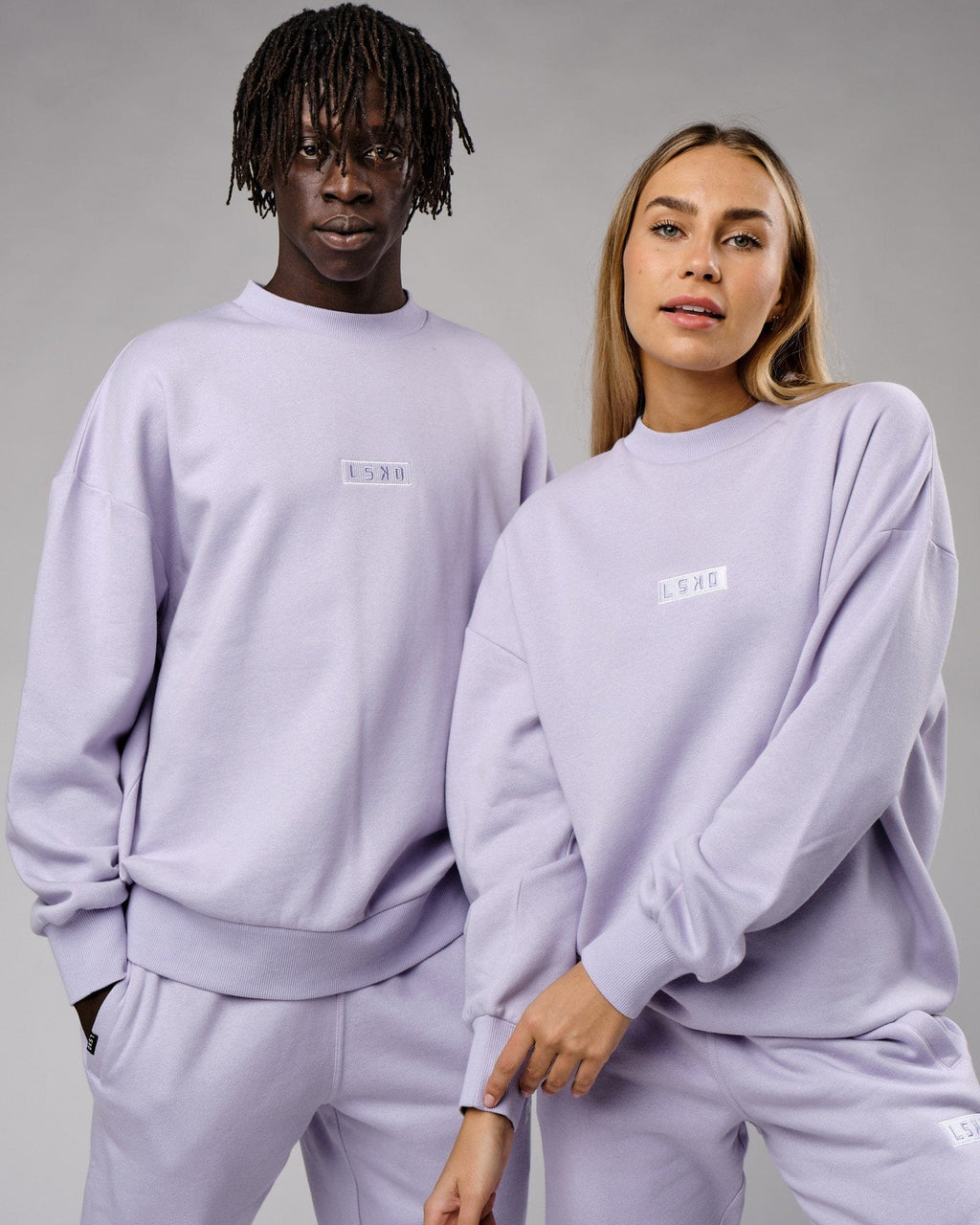 Model wearing Unisex Cornerstone Sweater Oversize - Cosmic Sky