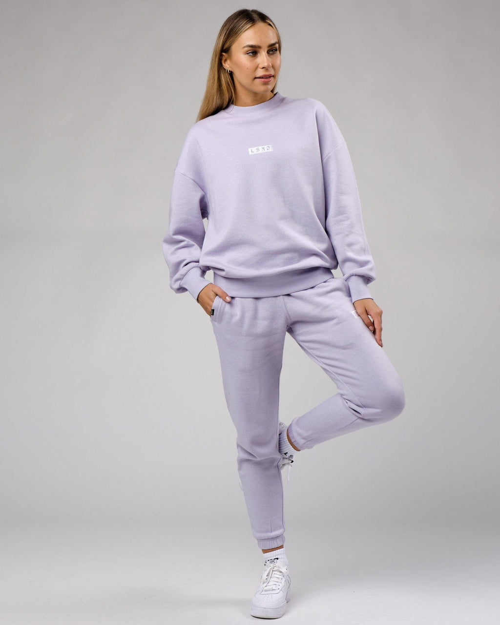 Model wearing Unisex Cornerstone Track Pant Oversize - Cosmic Sky