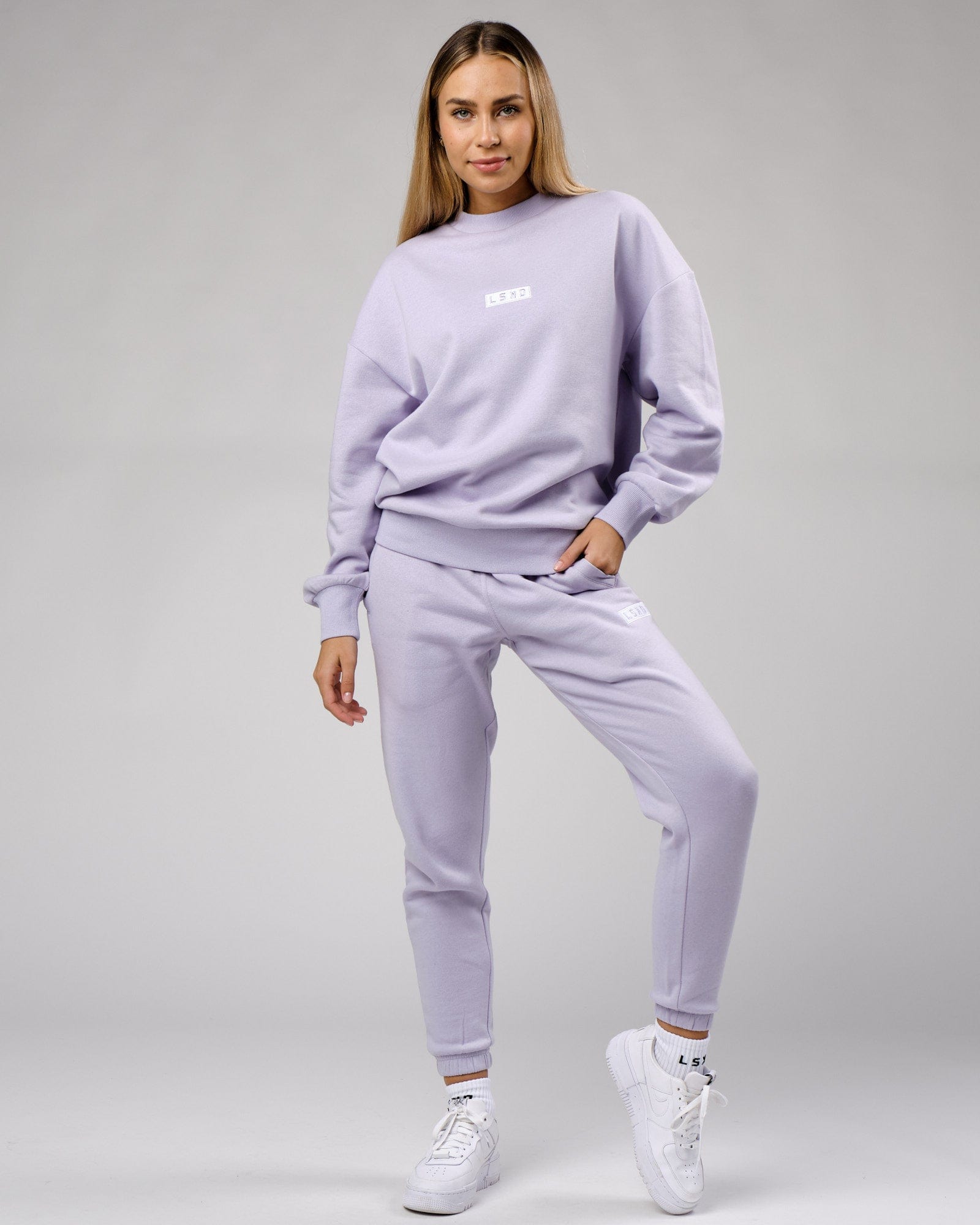 Model wearing Unisex Cornerstone Track Pant Oversize - Cosmic Sky