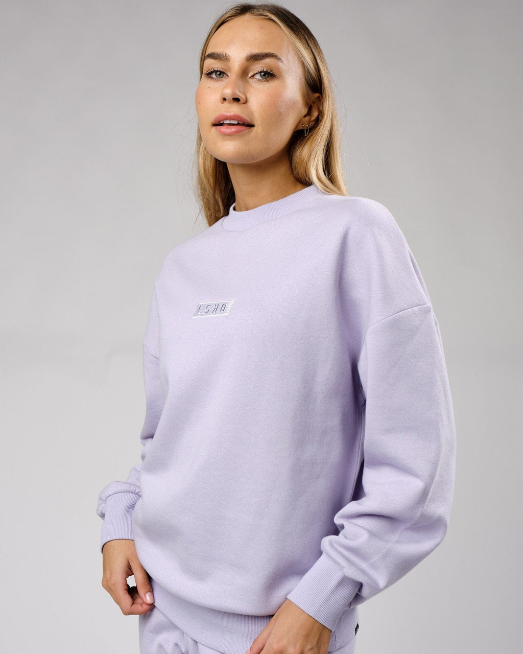 Model wearing Unisex Cornerstone Sweater Oversize - Cosmic Sky