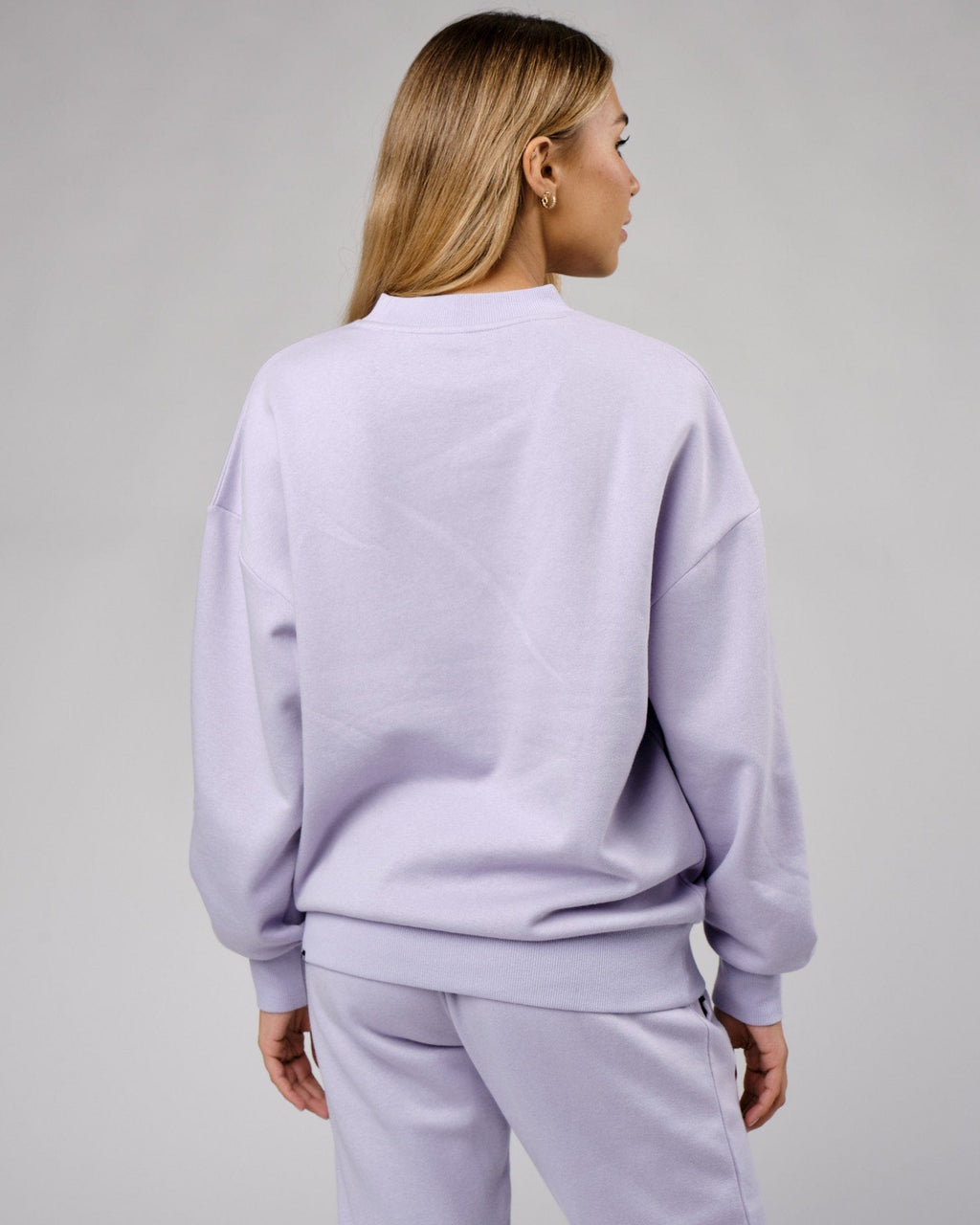 Model wearing Unisex Cornerstone Sweater Oversize - Cosmic Sky