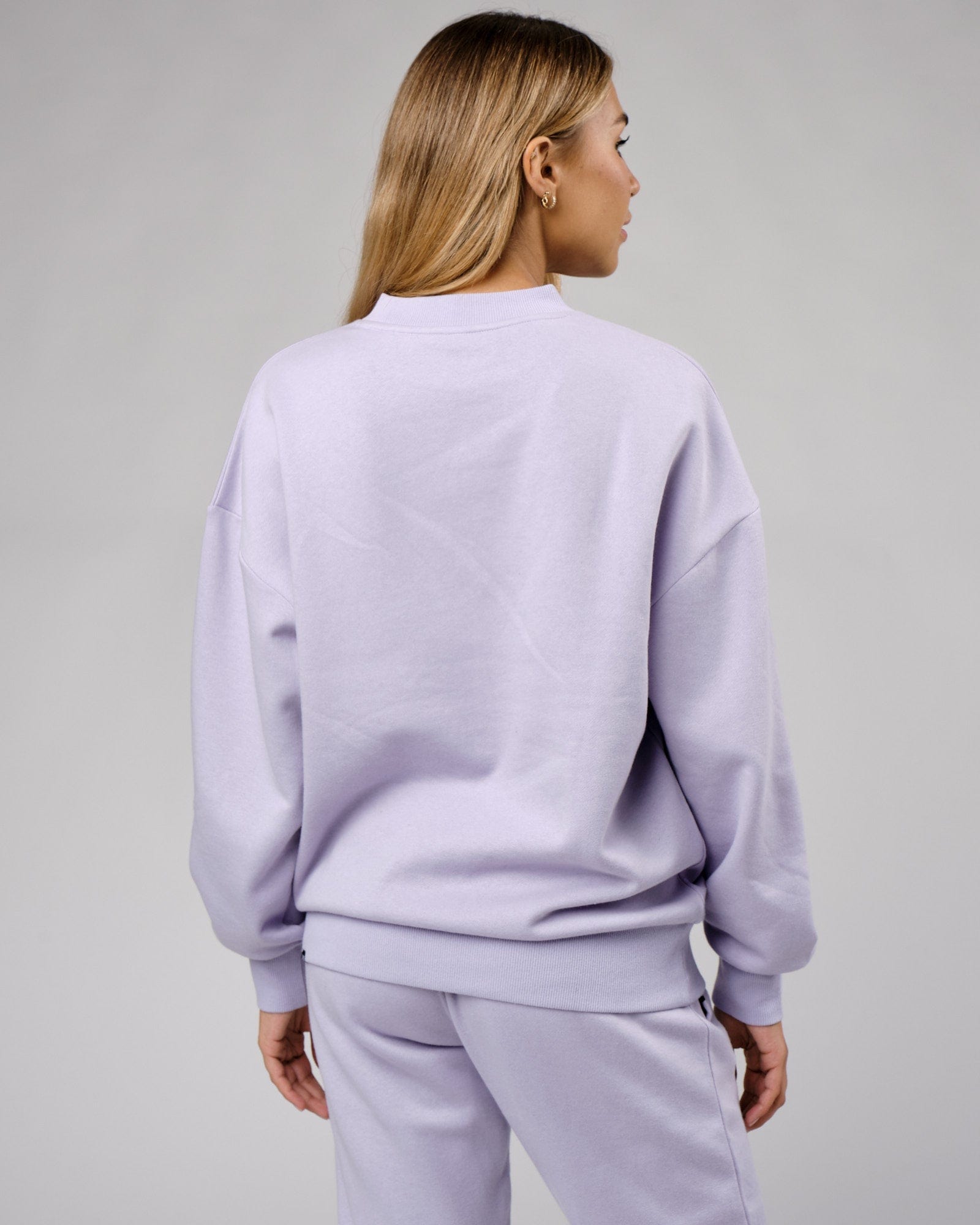 Model wearing Unisex Cornerstone Sweater Oversize - Cosmic Sky