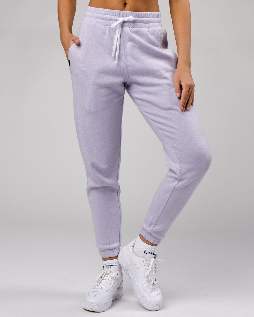 Model wearing Unisex Cornerstone Track Pant Oversize - Cosmic Sky