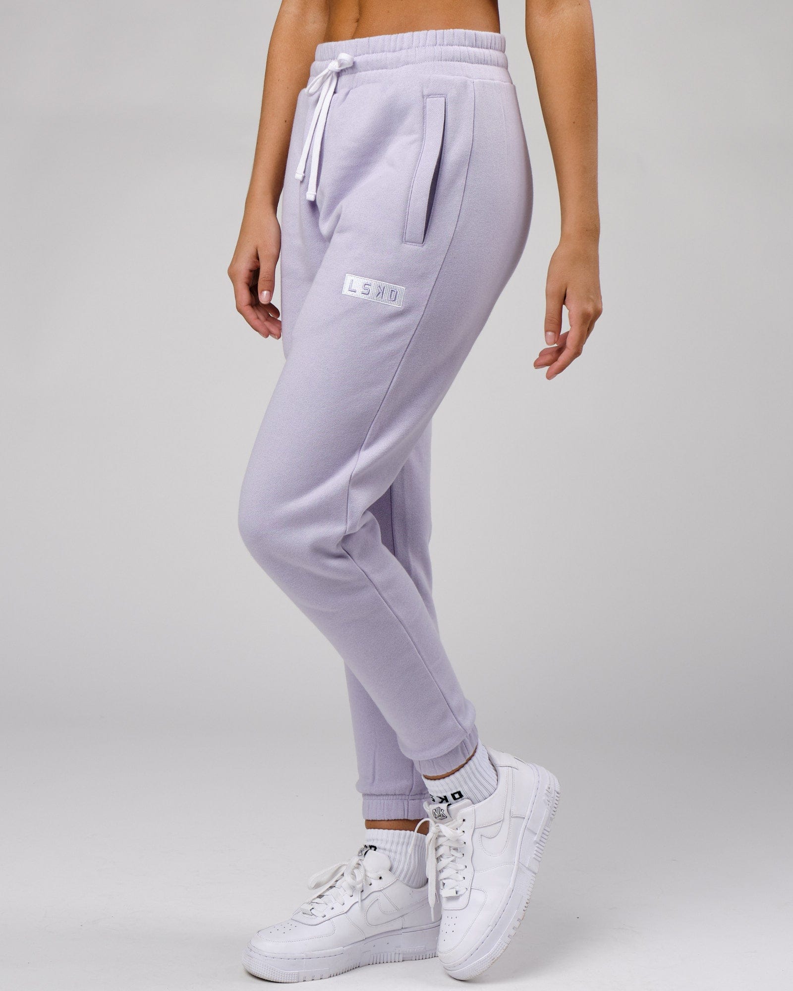 Model wearing Unisex Cornerstone Track Pant Oversize - Cosmic Sky