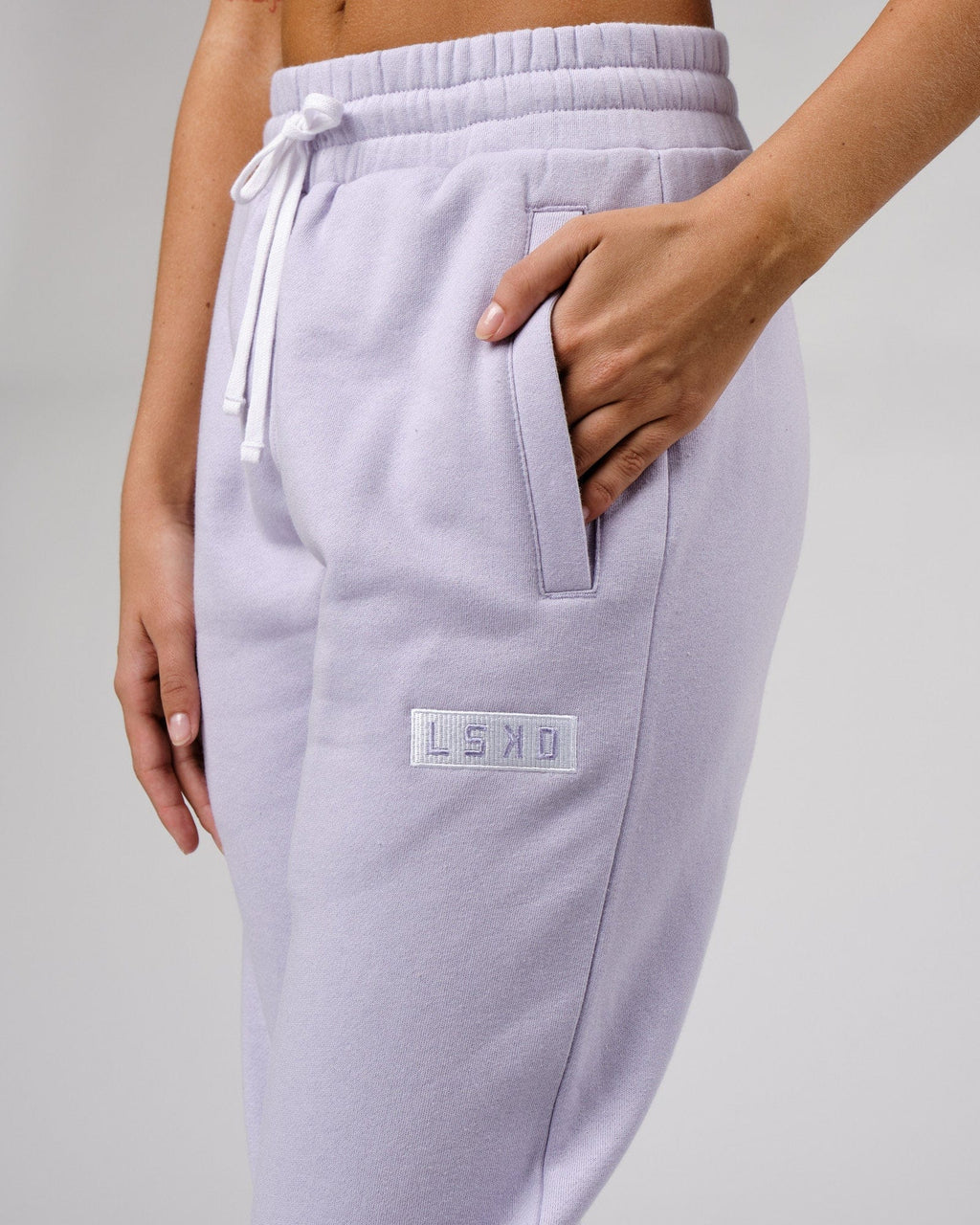 Model wearing Unisex Cornerstone Track Pant Oversize - Cosmic Sky