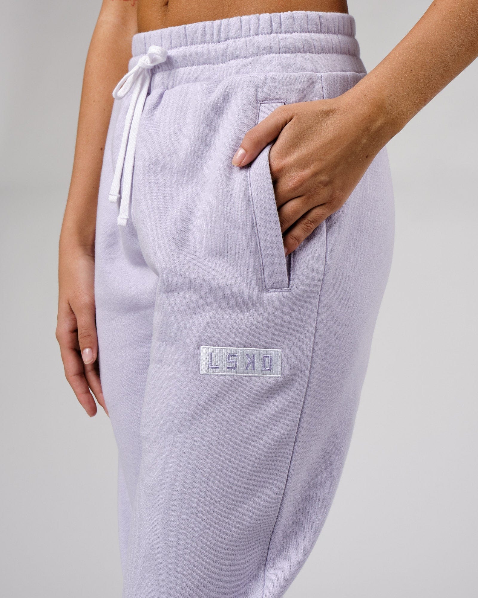 Model wearing Unisex Cornerstone Track Pant Oversize - Cosmic Sky