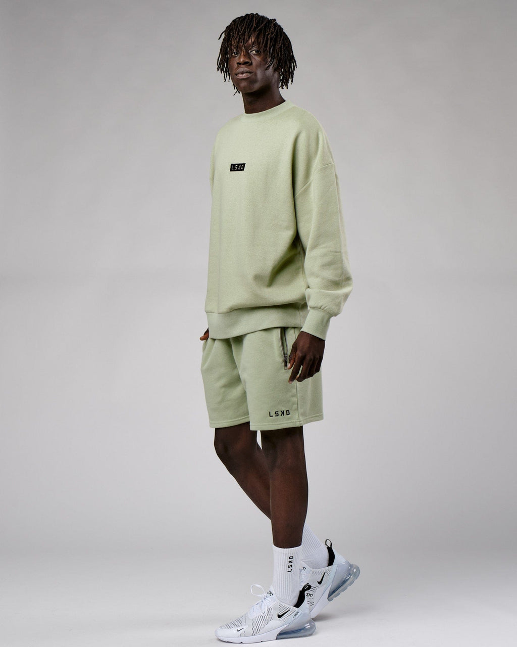 Model wearing Cornerstone Sweater Oversize - Desert Sage