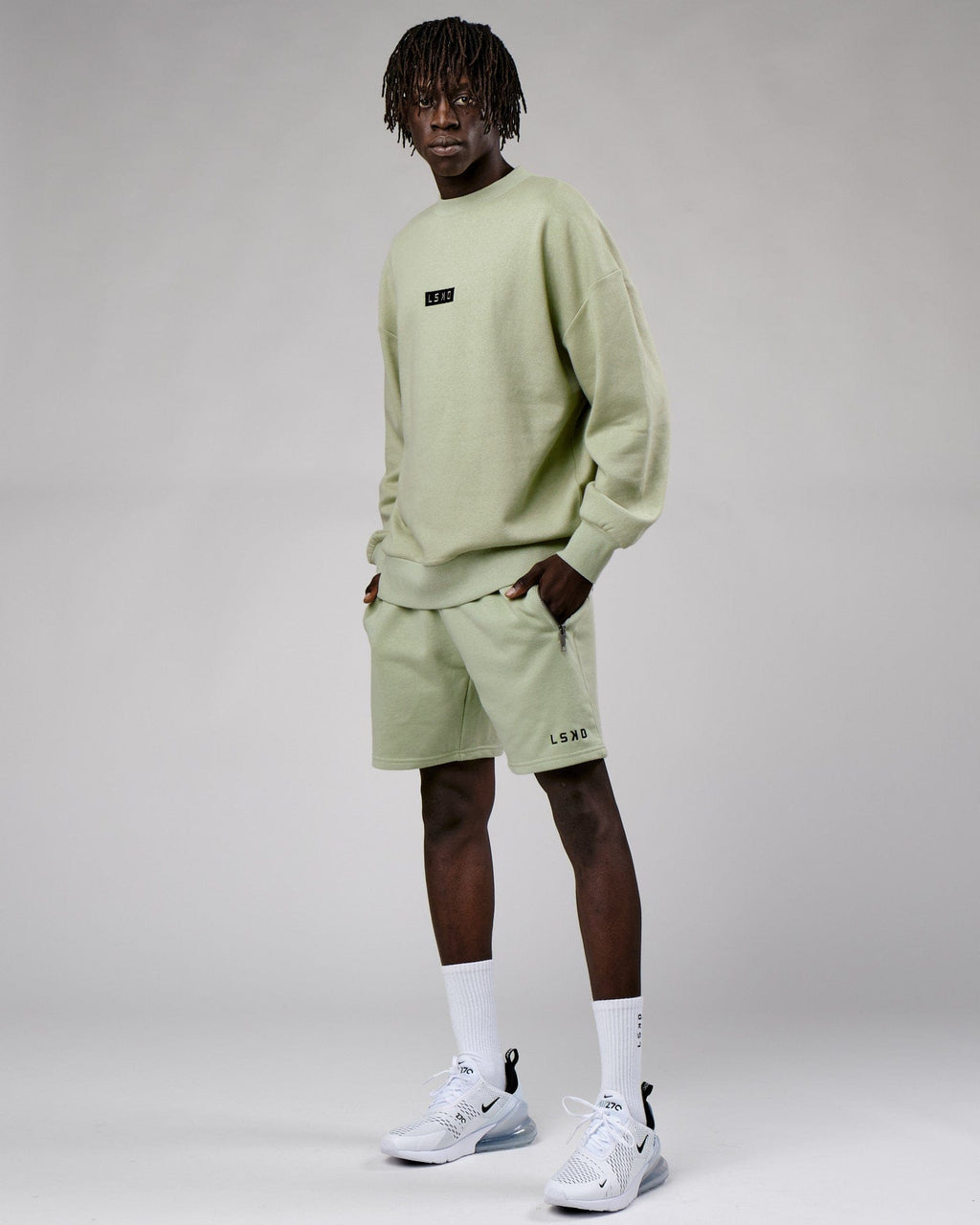 Model wearing Cornerstone Sweater Oversize - Desert Sage